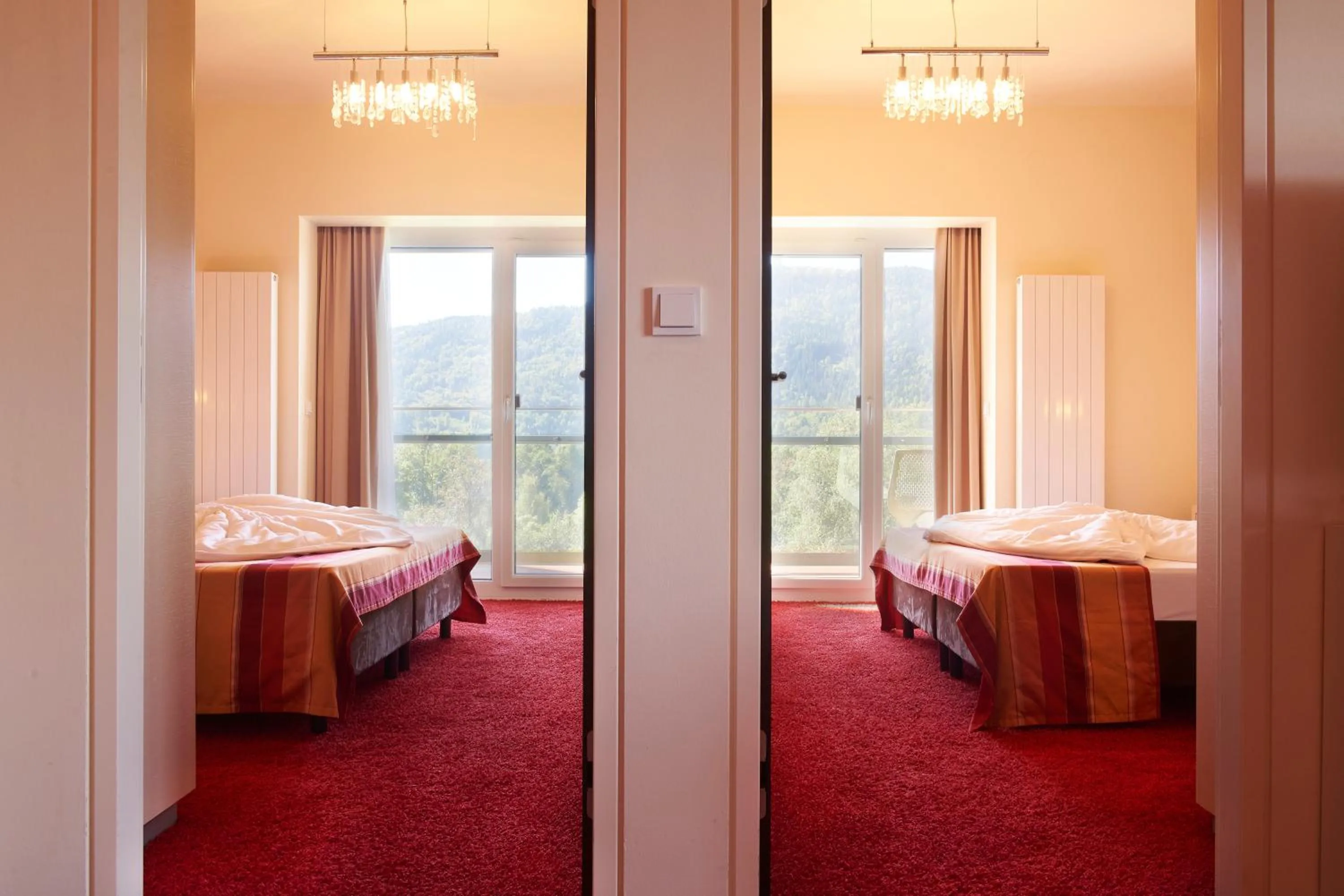 Bedroom, Bed in Parkhotel Pörtschach - Das Hotelresort mit Insellage am Wörthersee