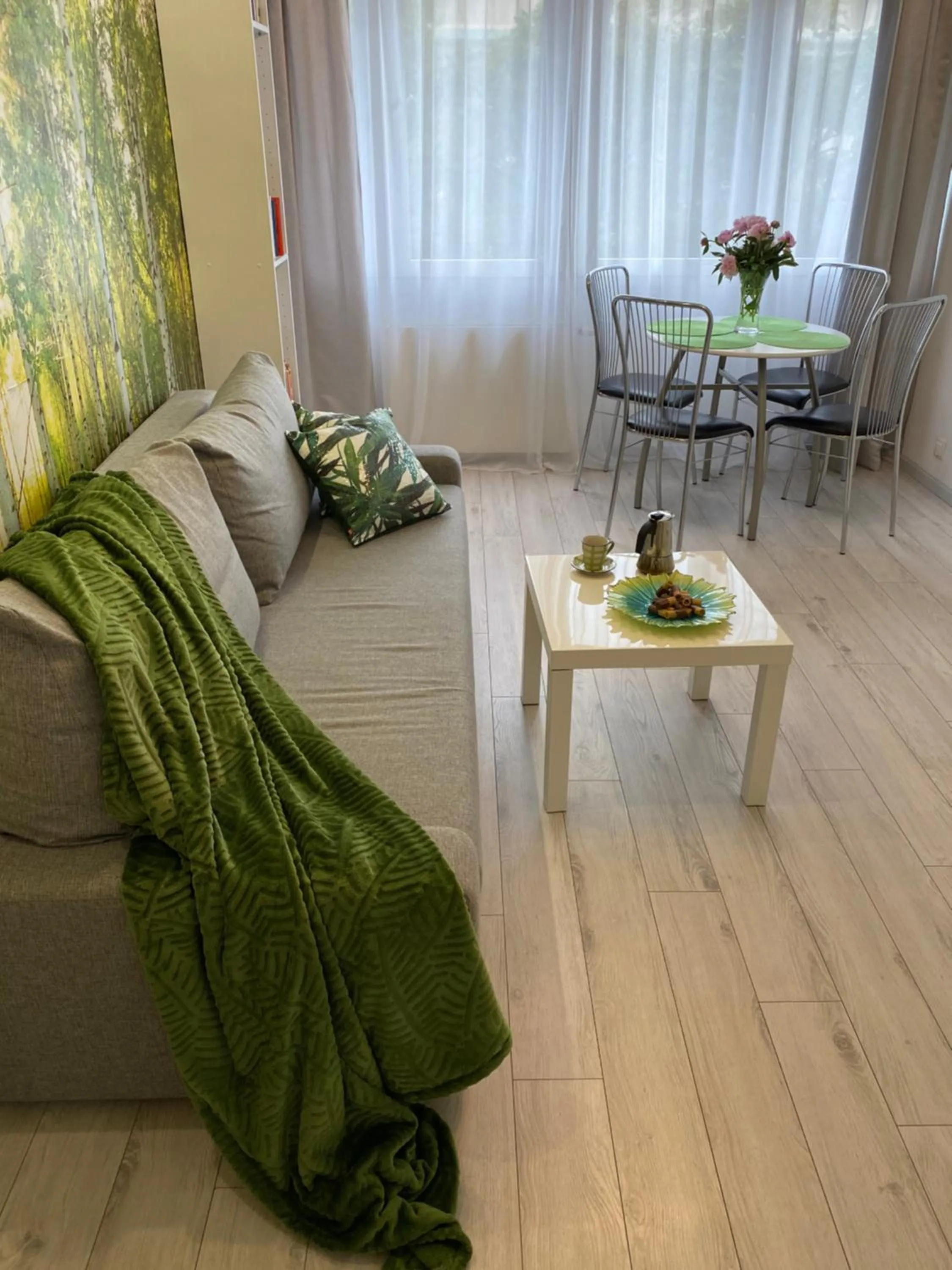 Communal lounge/ TV room in Good Time Apartments Warsaw City Center