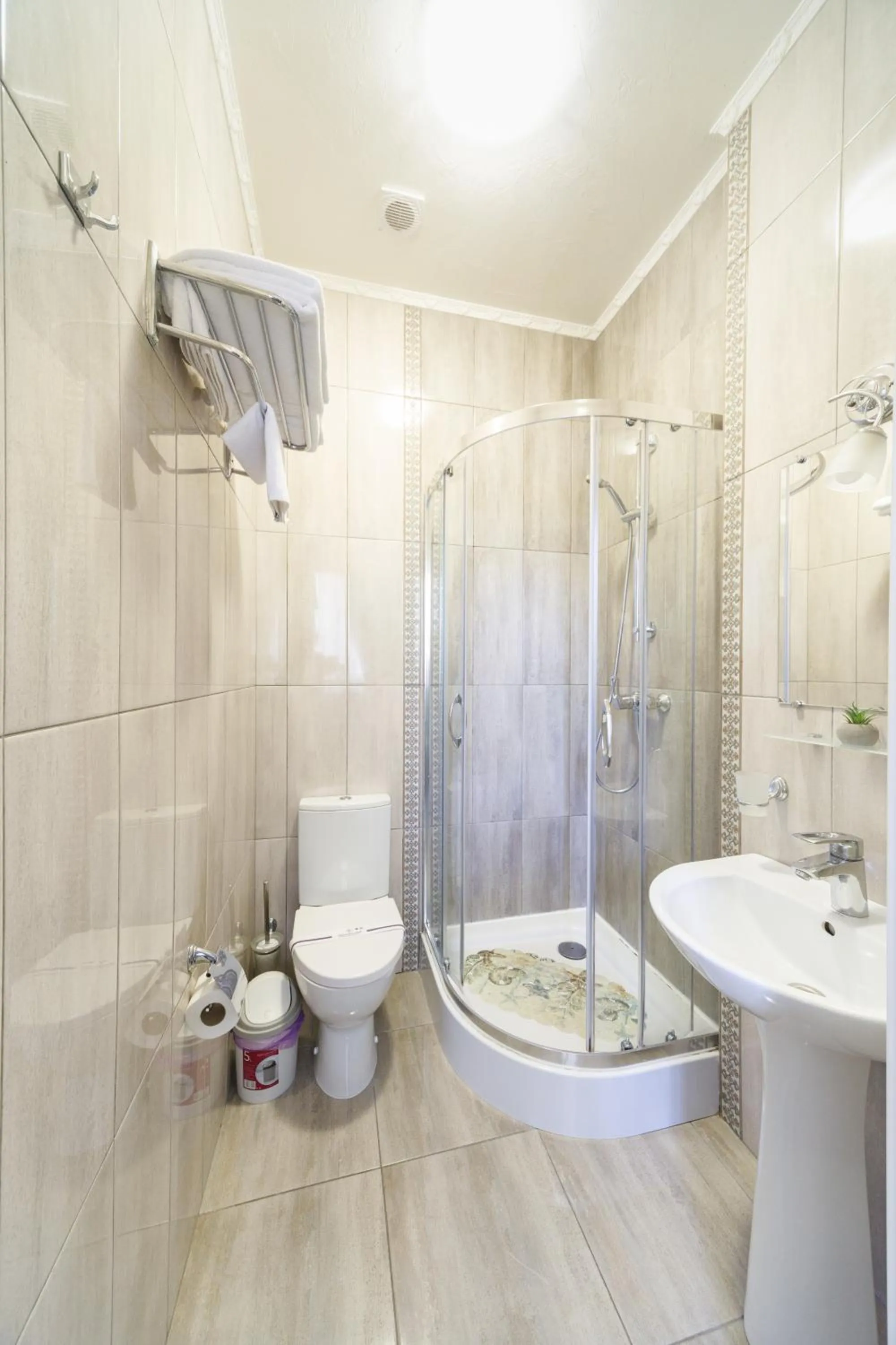 Shower in L.O.Y Family Hotel