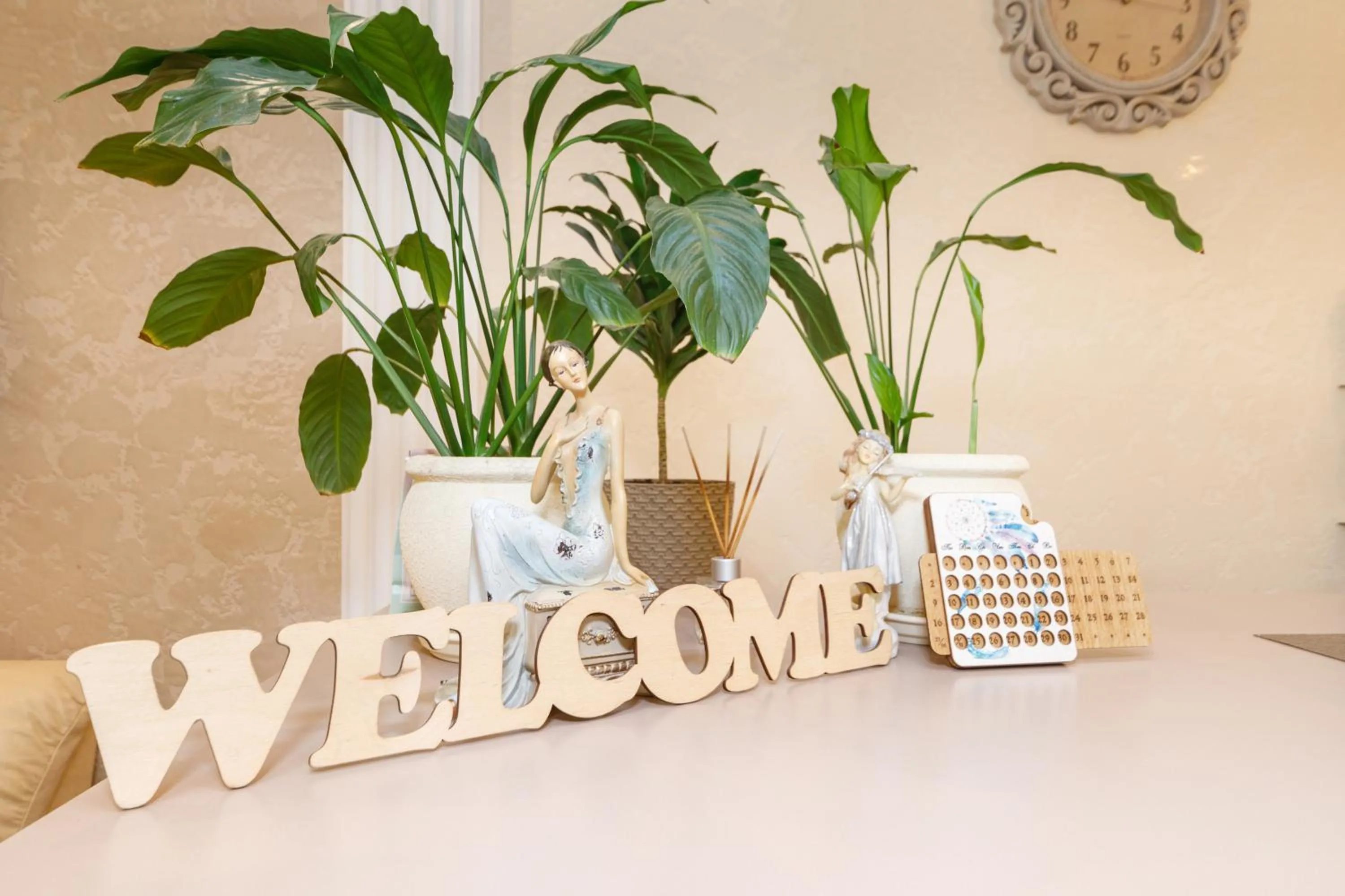 Text overlay in L.O.Y Family Hotel