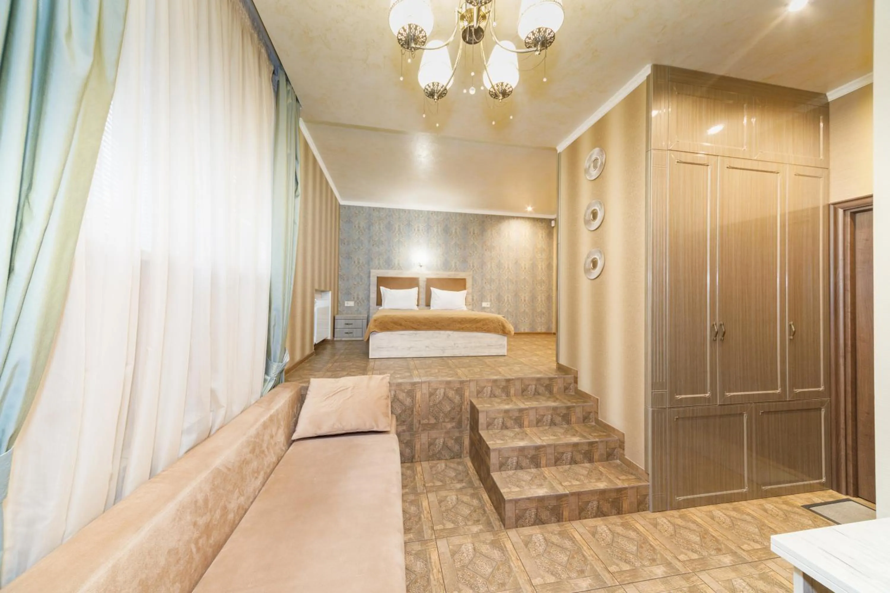 Bed in L.O.Y Family Hotel