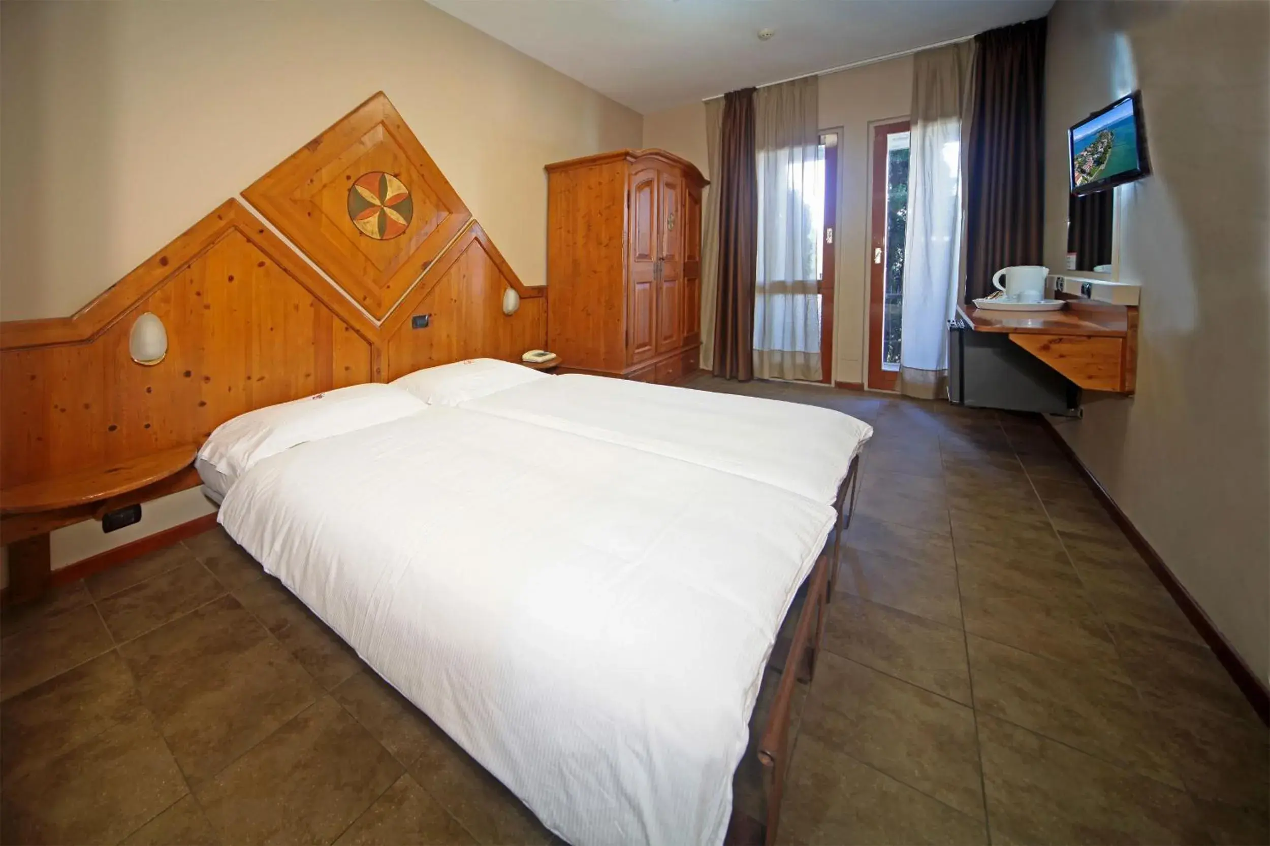Economy Double or Twin Room - single occupancy in Hotel Smeraldo Economy Double or Twin Room - single occupancy in Hotel Smeraldo
