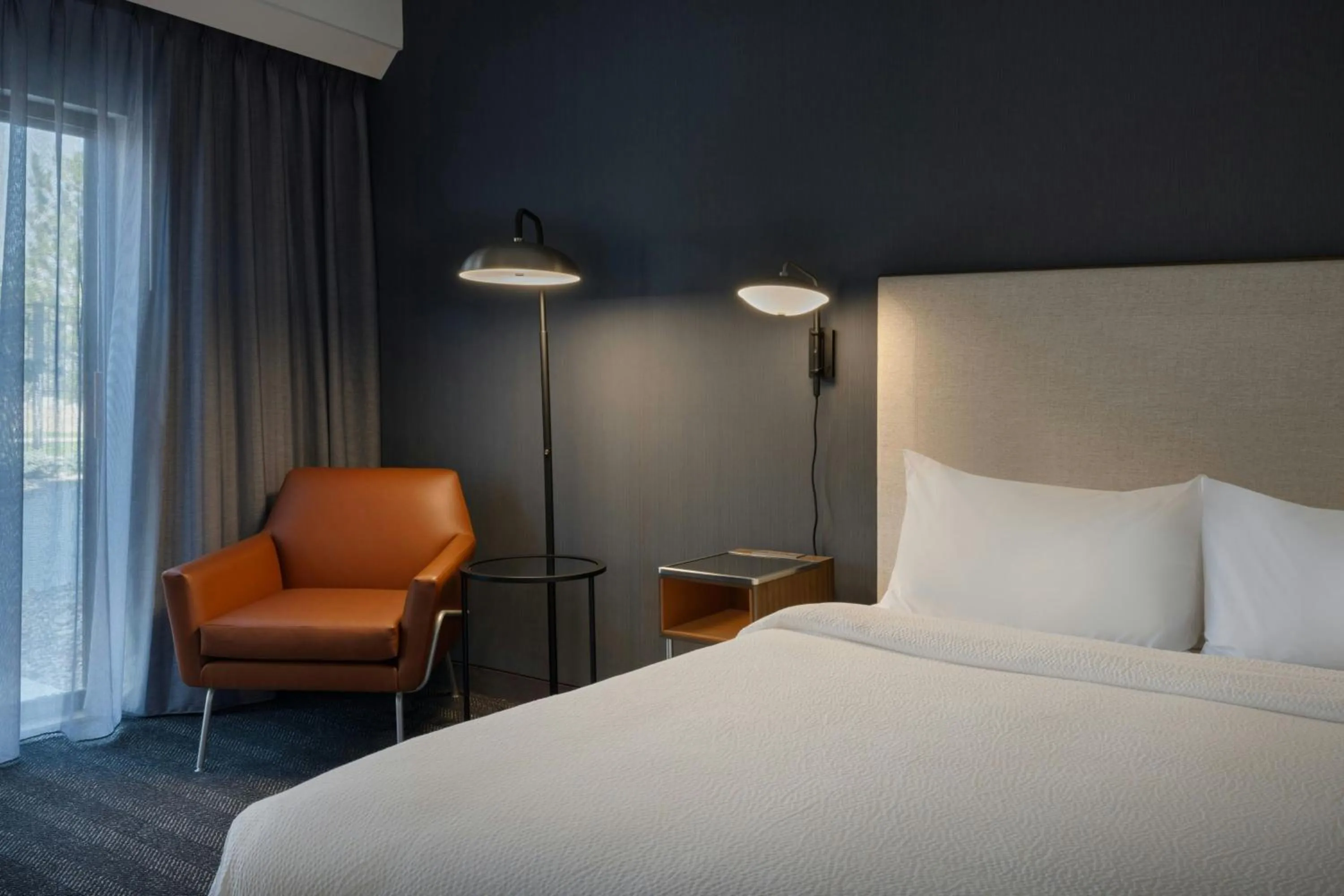 Photo of the whole room, Bed in Courtyard Casper