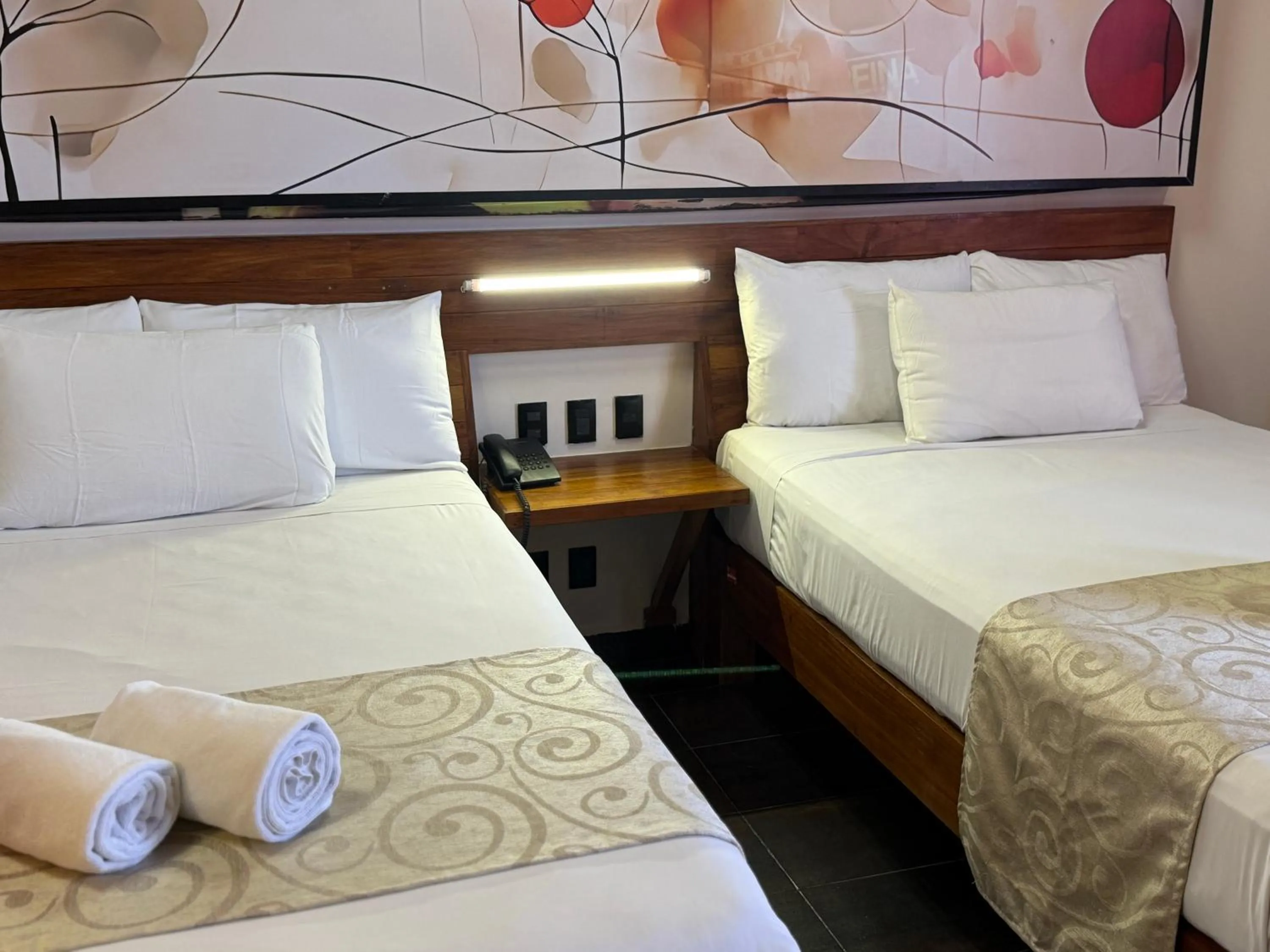 Bed in Reina Roja Hotel Boutique