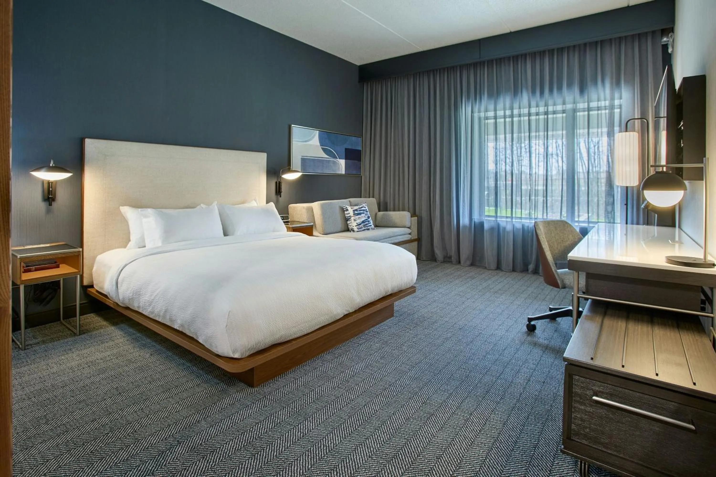 Photo of the whole room, Bed in Courtyard Wausau