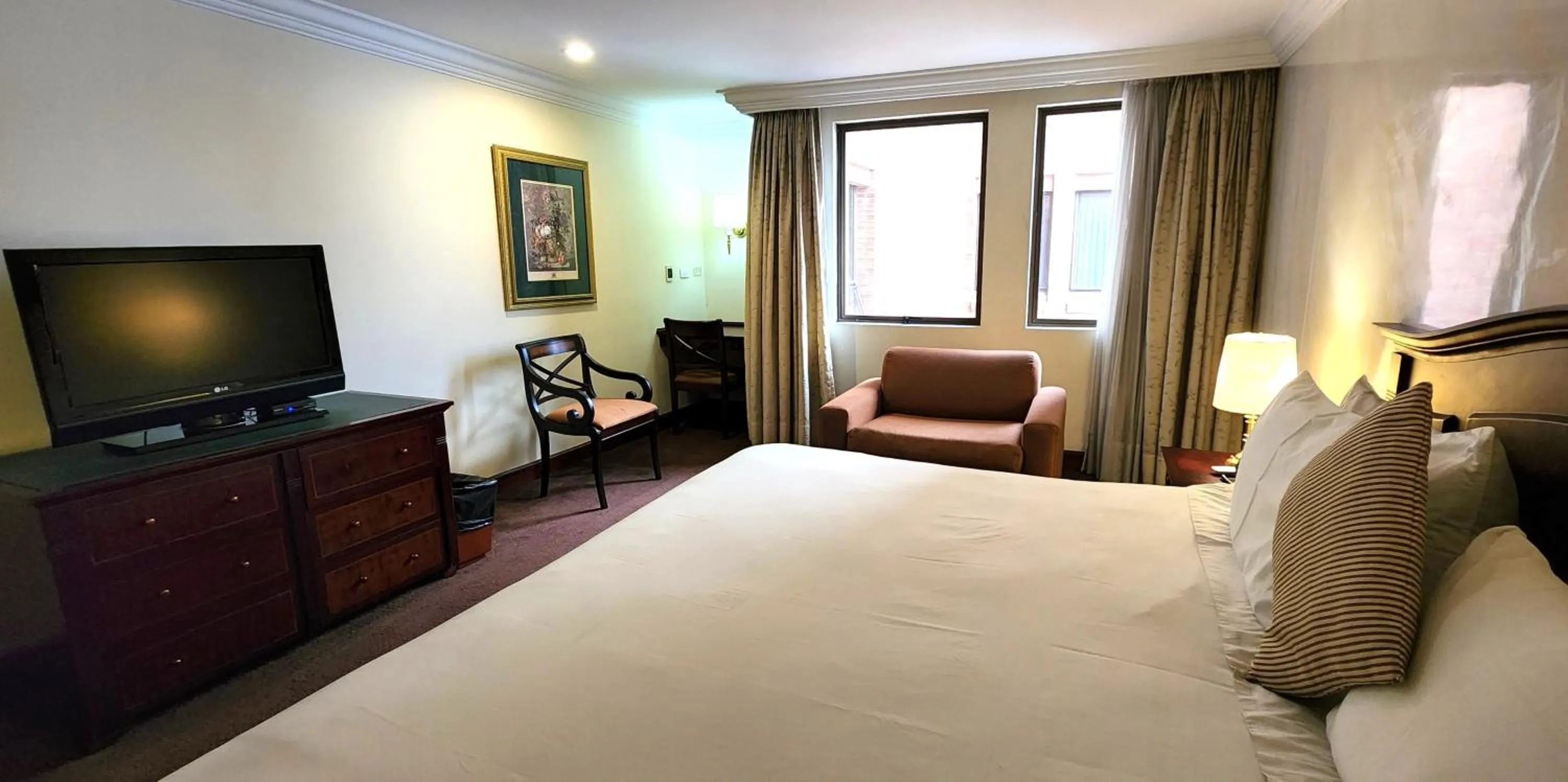 Bed in Santafe Boutique Hotel