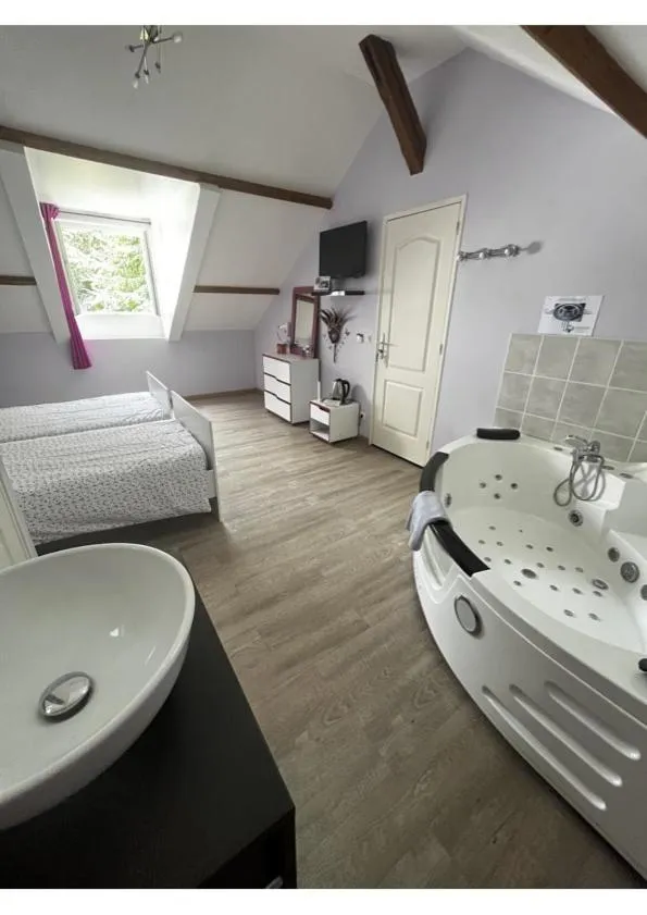 Bed in Le petit manoir