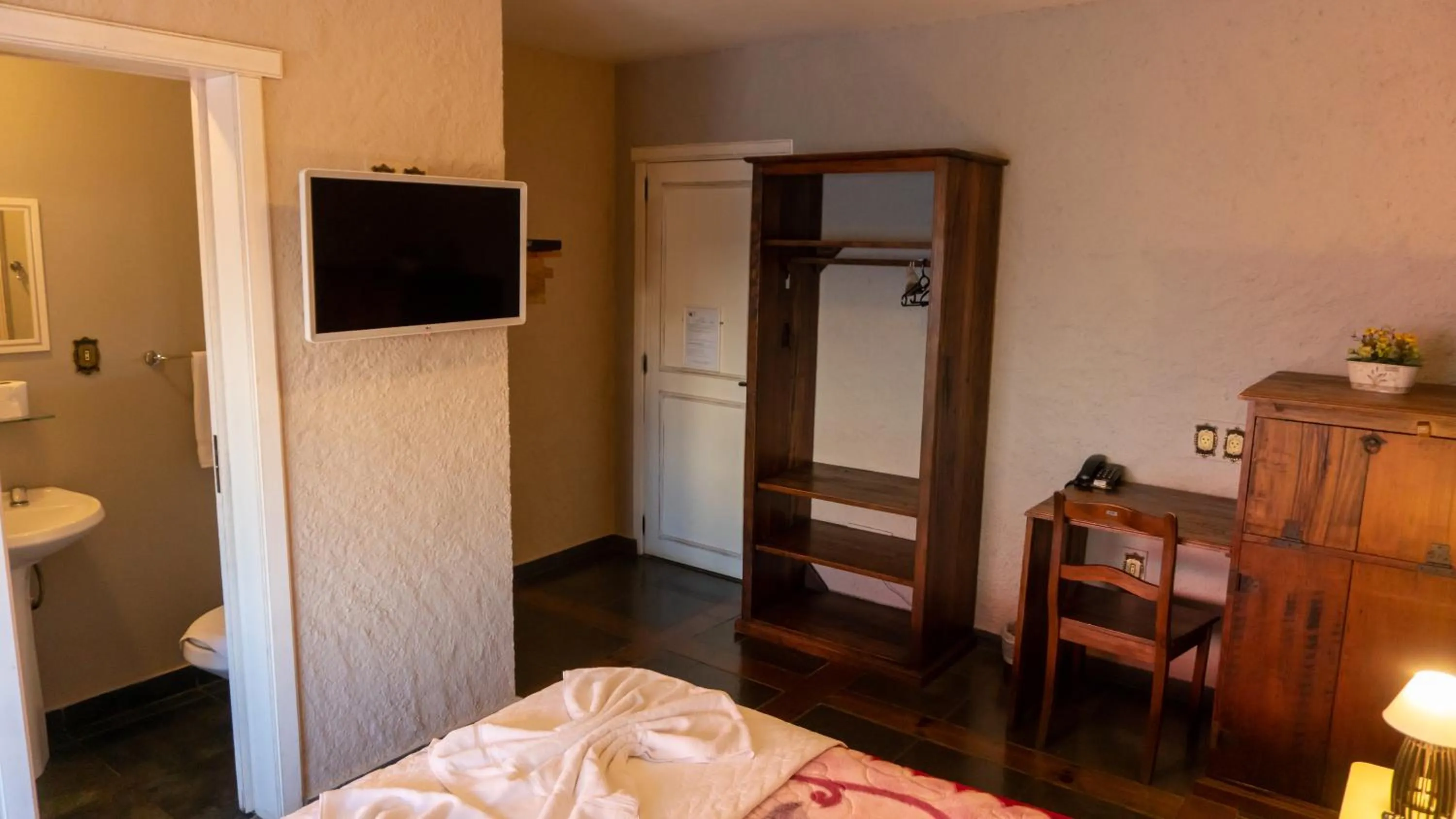 Bed in Aardvark Inn Pousada