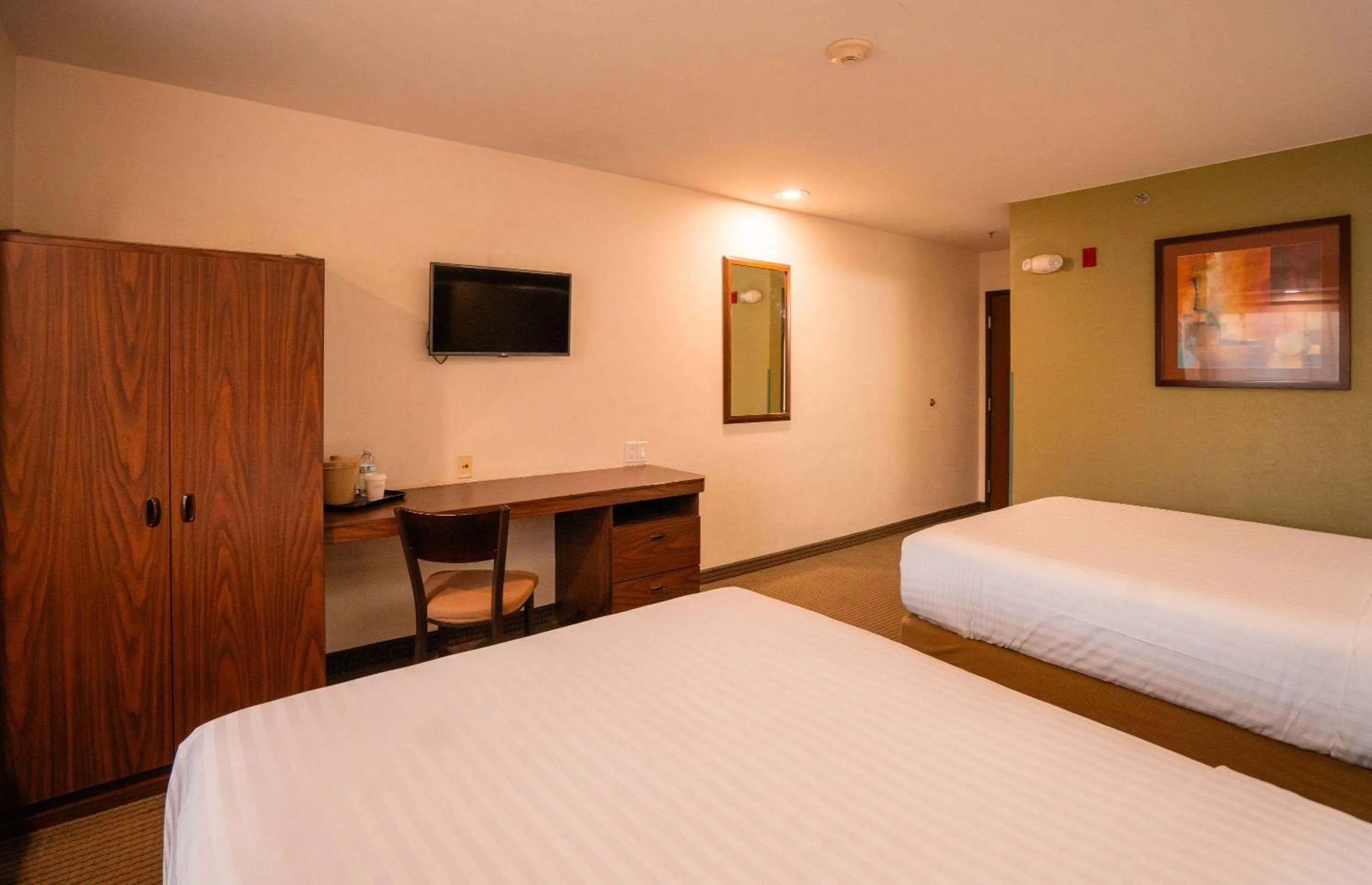 Photo of the whole room, Bed in Microtel Inn and Suites by Wyndham Ciudad Juarez, US Consulate