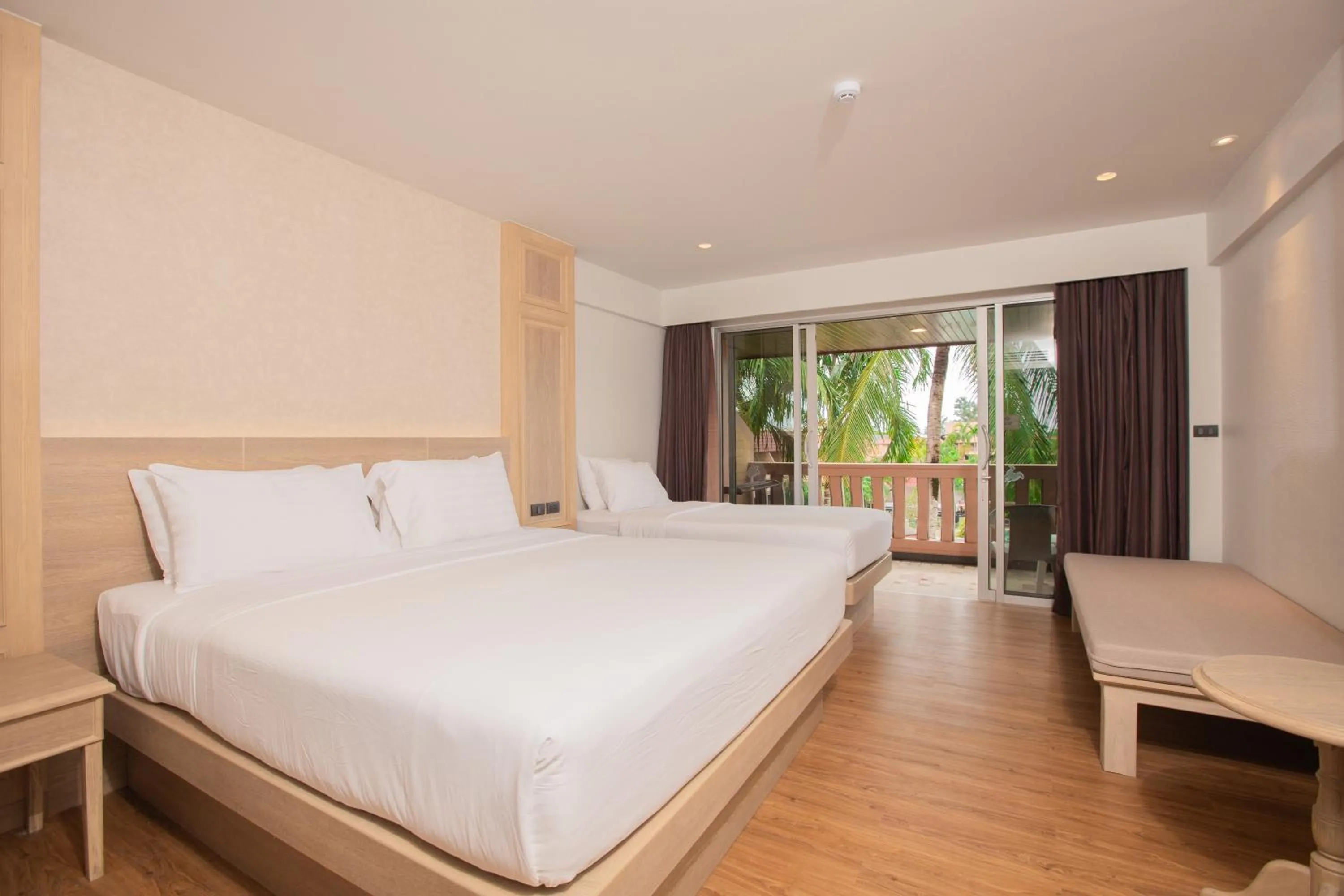Bed in Phuket Orchid Resort and Spa