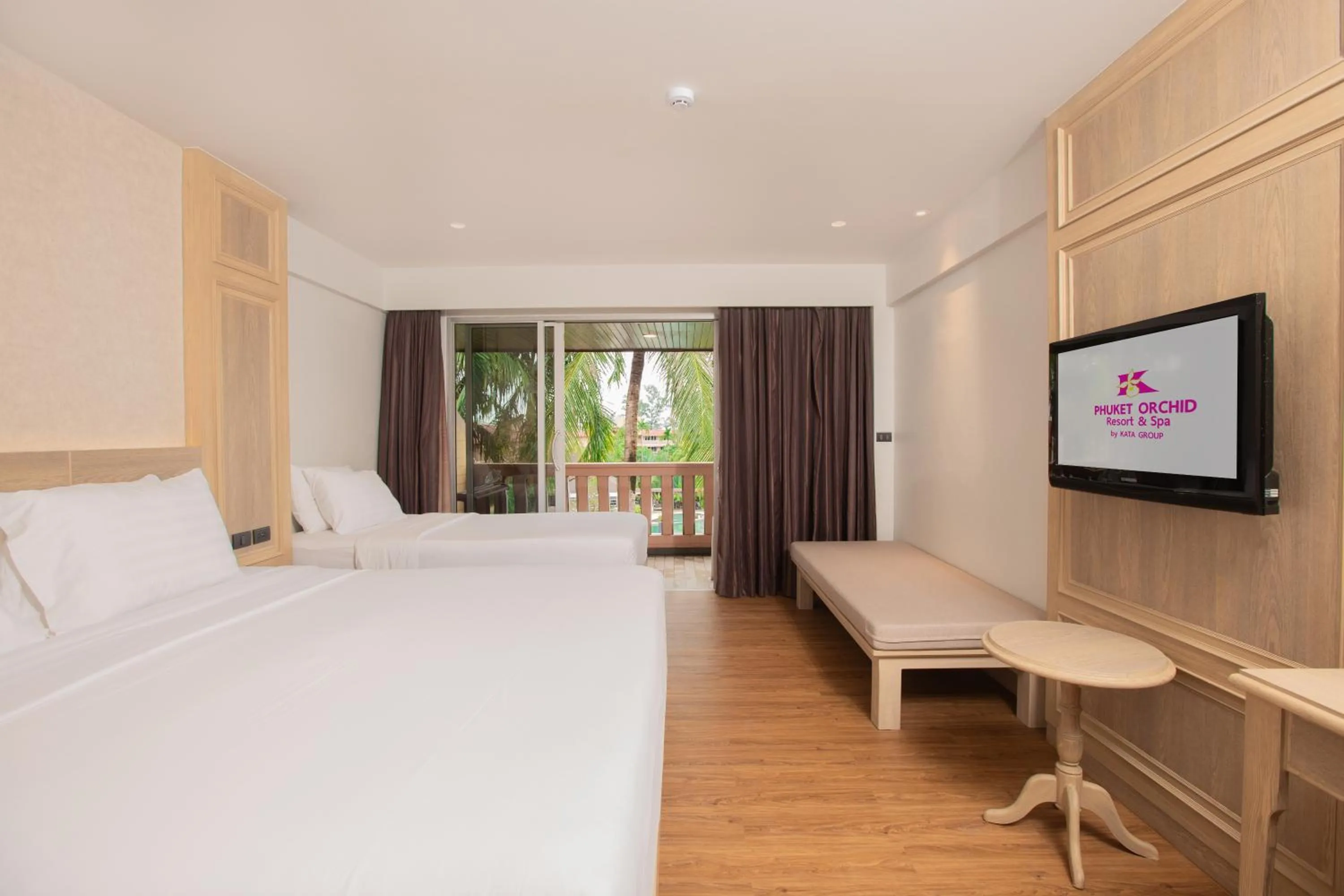 Bed in Phuket Orchid Resort and Spa