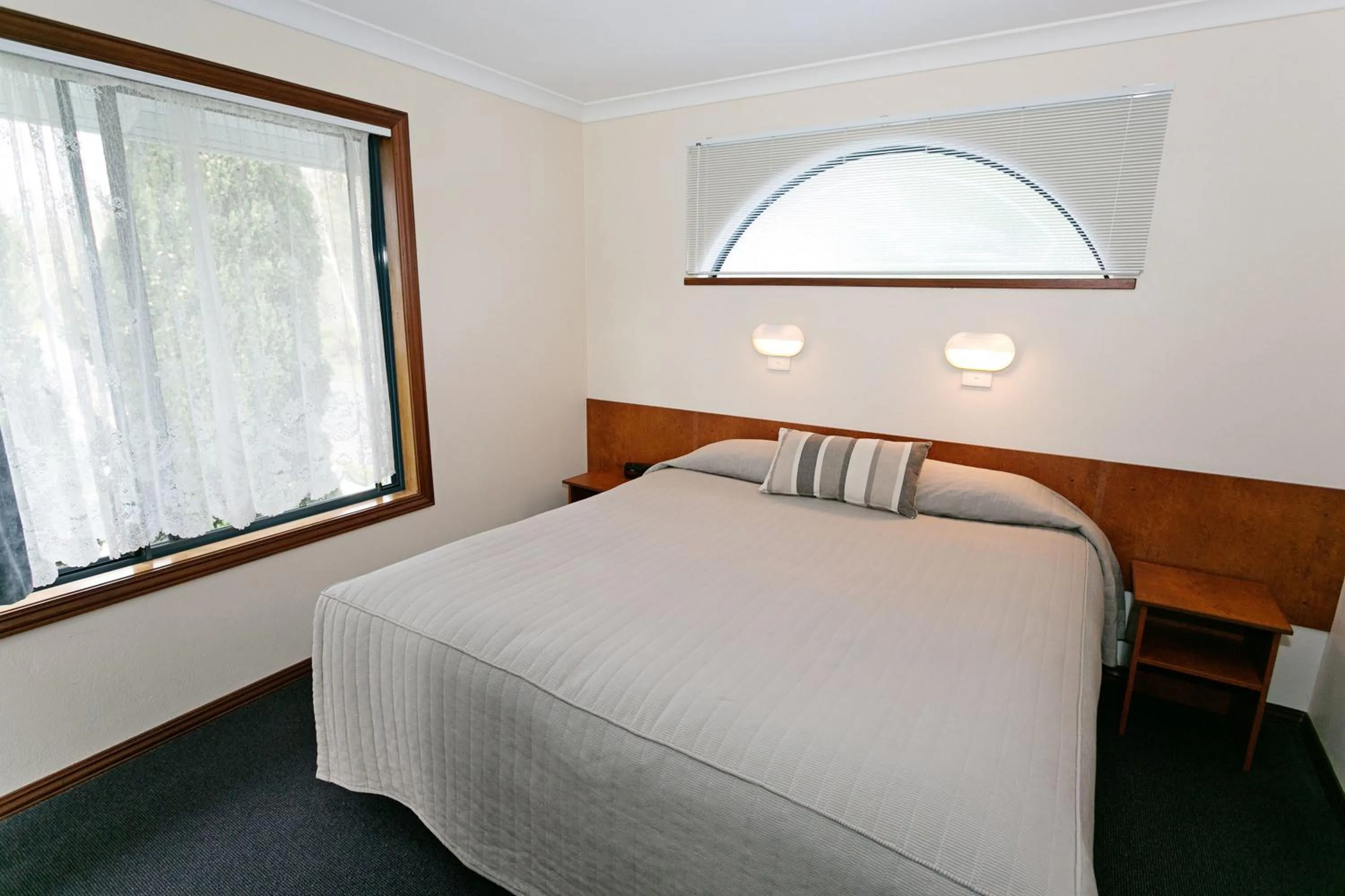 Bedroom, Bed in Dolphin Lodge Albany - Self Contained Apartments at Middleton Beach