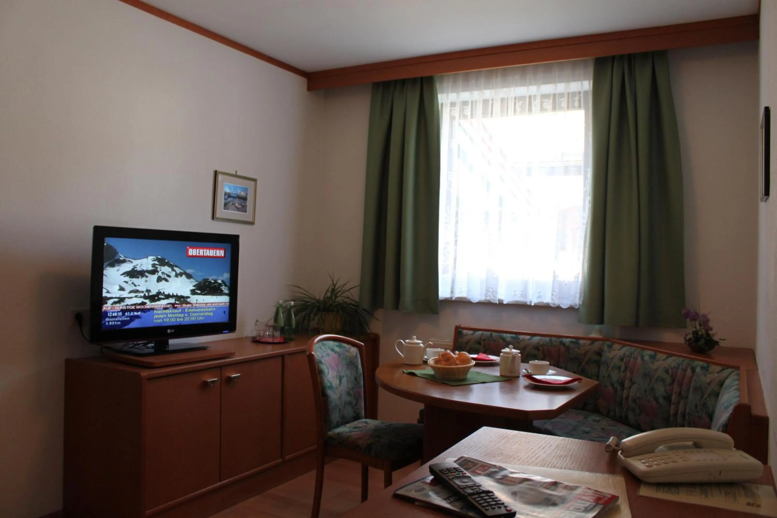 Living room in Hotel Bella