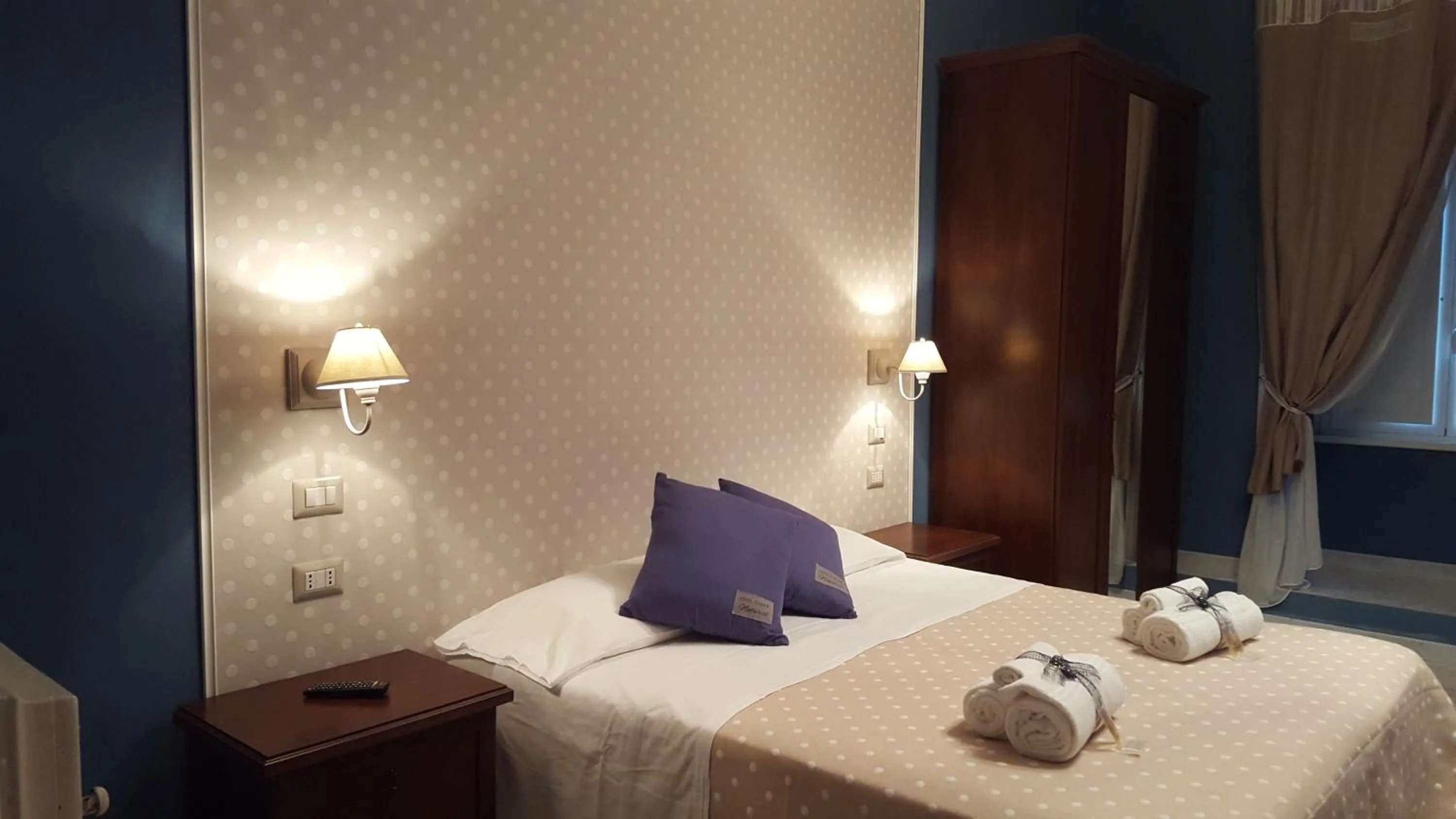 Photo of the whole room, Bed in La Locanda dell'Angelo