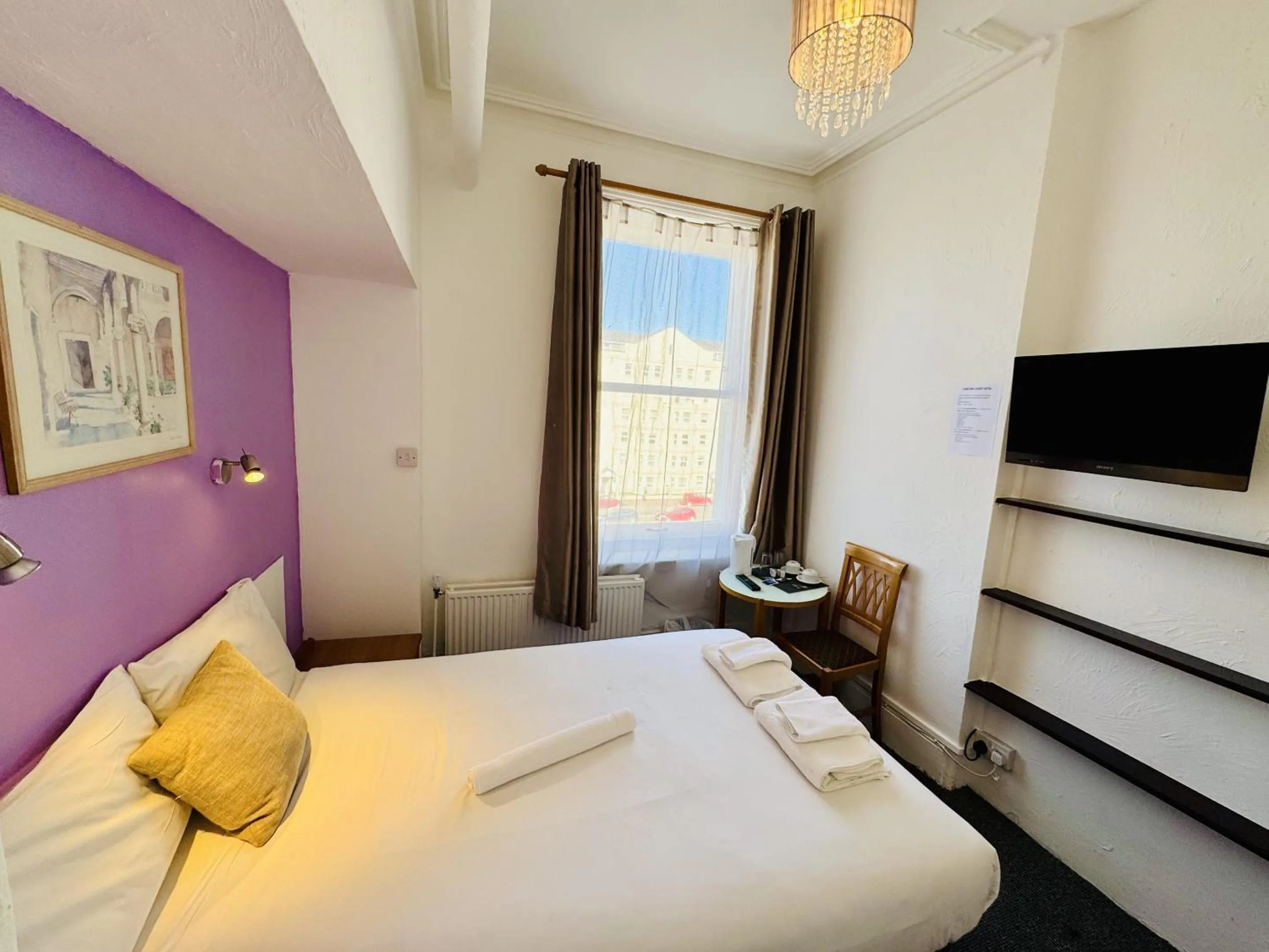 Bedroom, Bed in Carlton Court Hotel Eastbourne