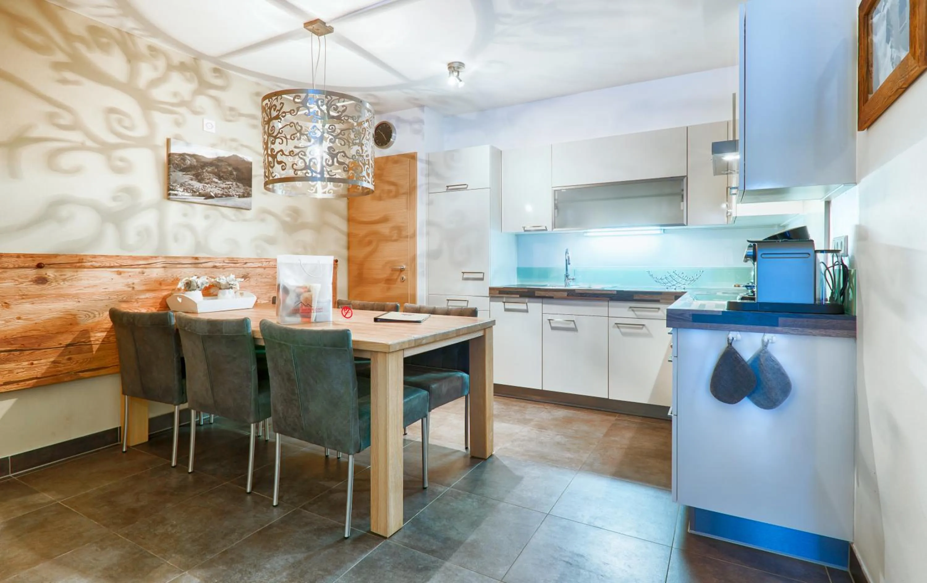 Kitchen or kitchenette in AvenidA Mountain Resort by Alpin Rentals