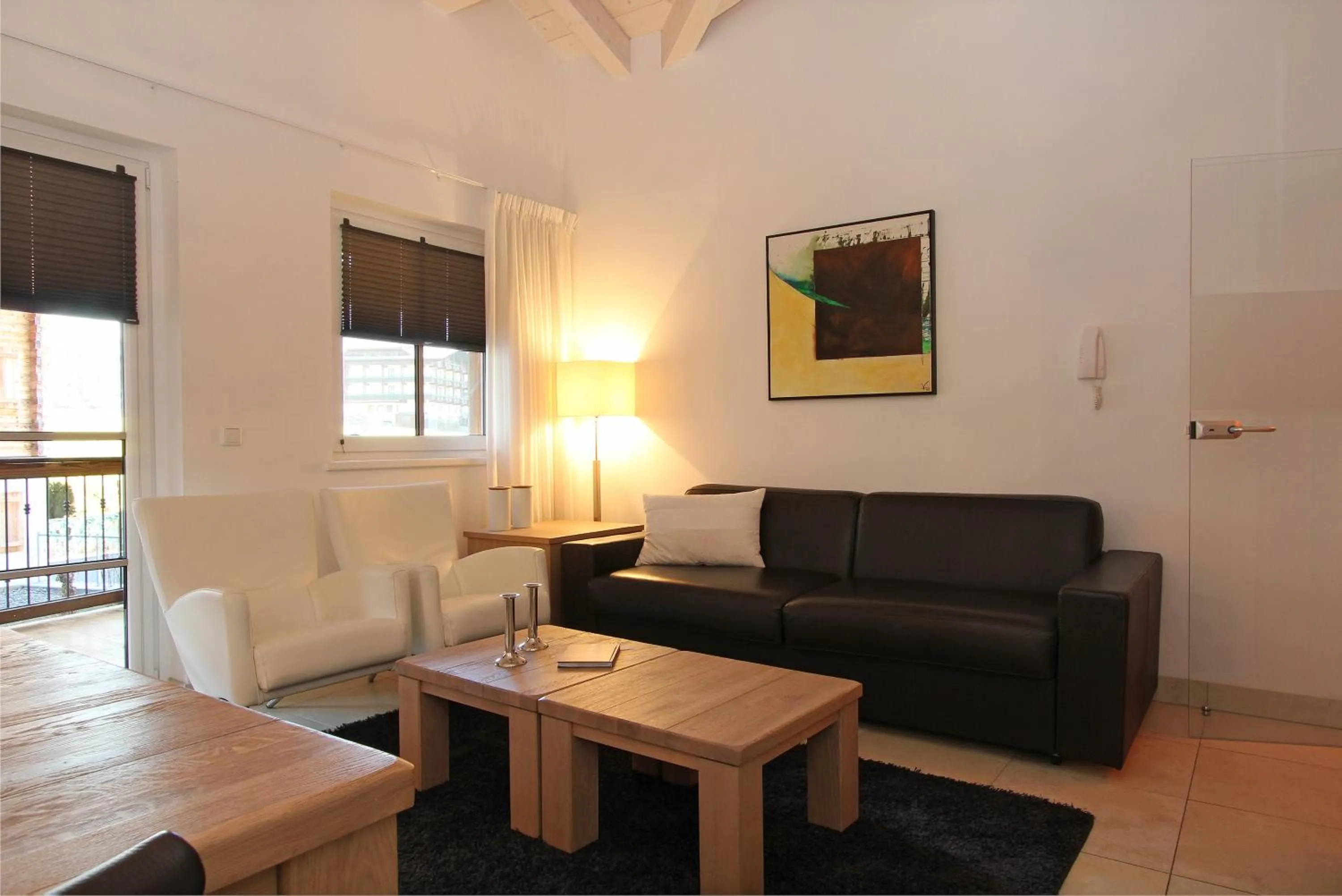 Living room in AvenidA Mountain Resort by Alpin Rentals