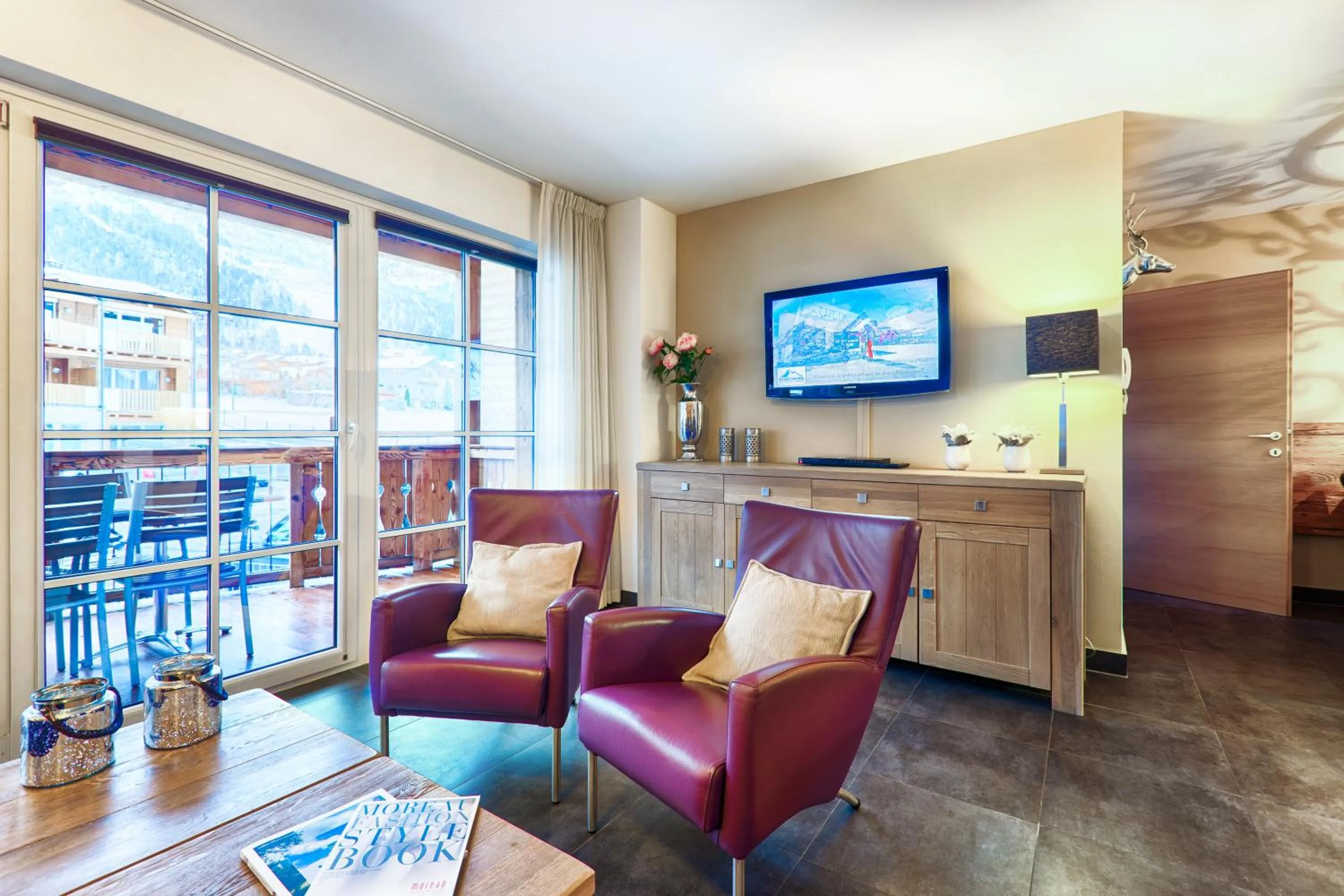 TV and multimedia in AvenidA Mountain Resort by Alpin Rentals