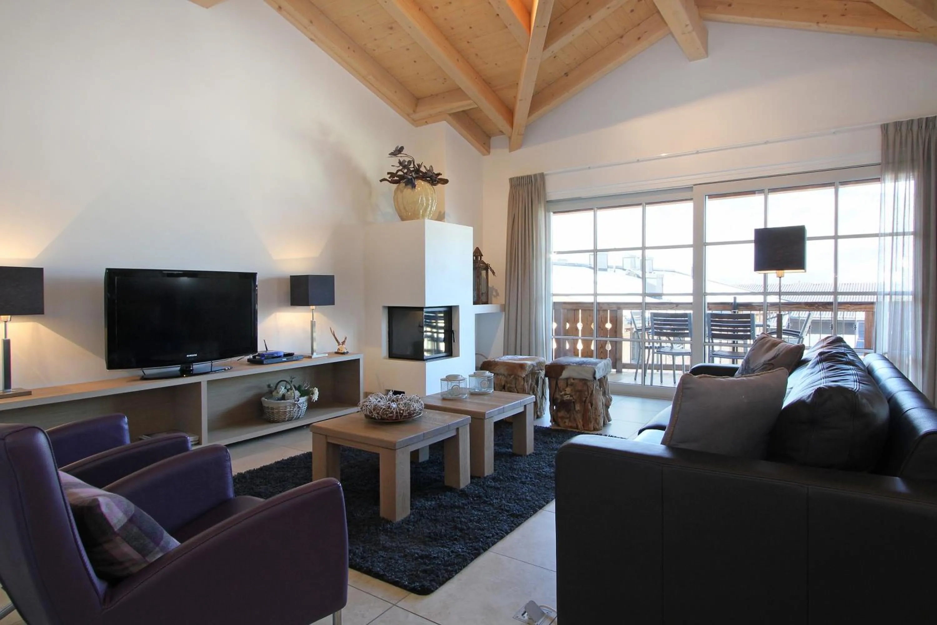 Living room in AvenidA Mountain Resort by Alpin Rentals