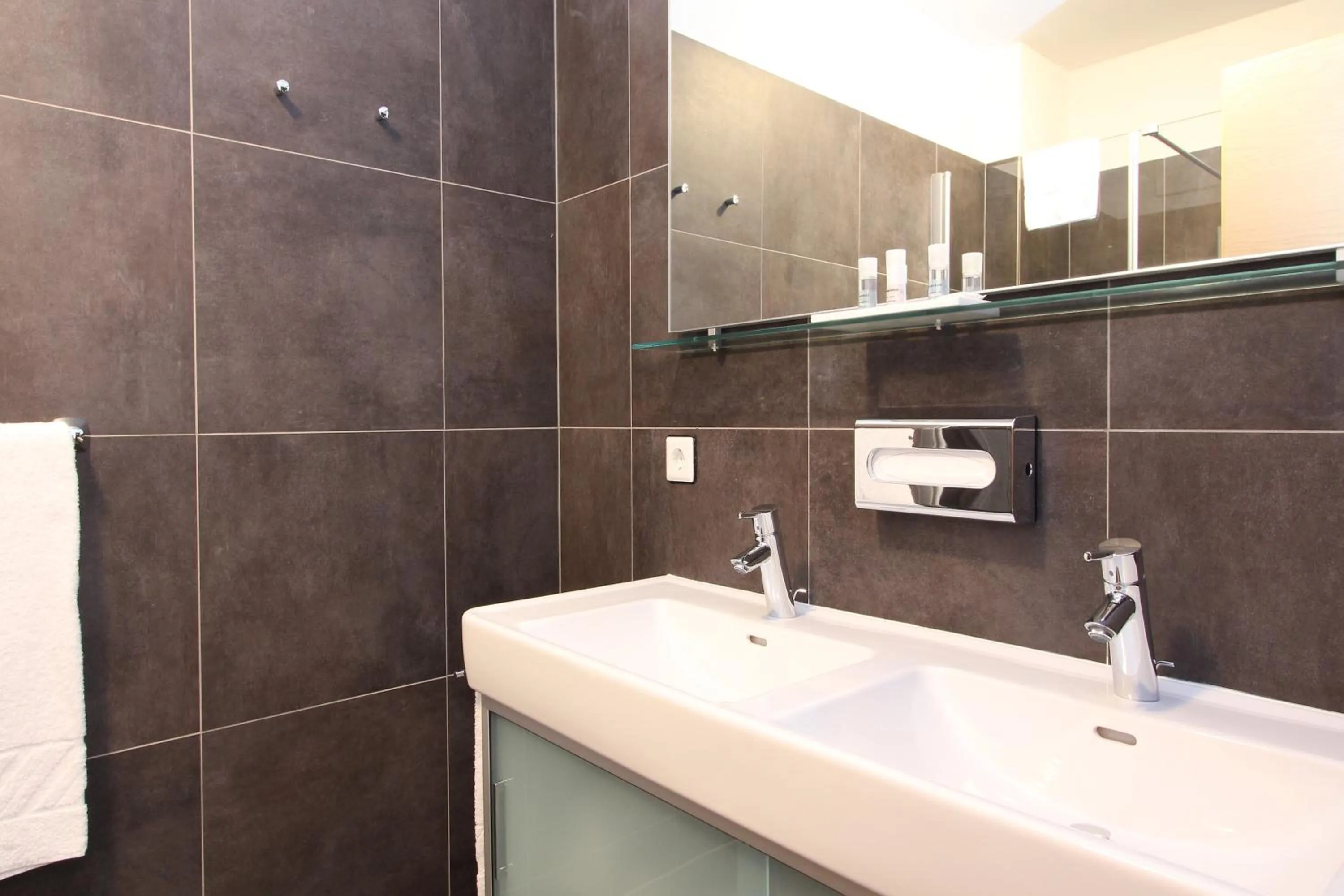 Bathroom in AvenidA Mountain Resort by Alpin Rentals