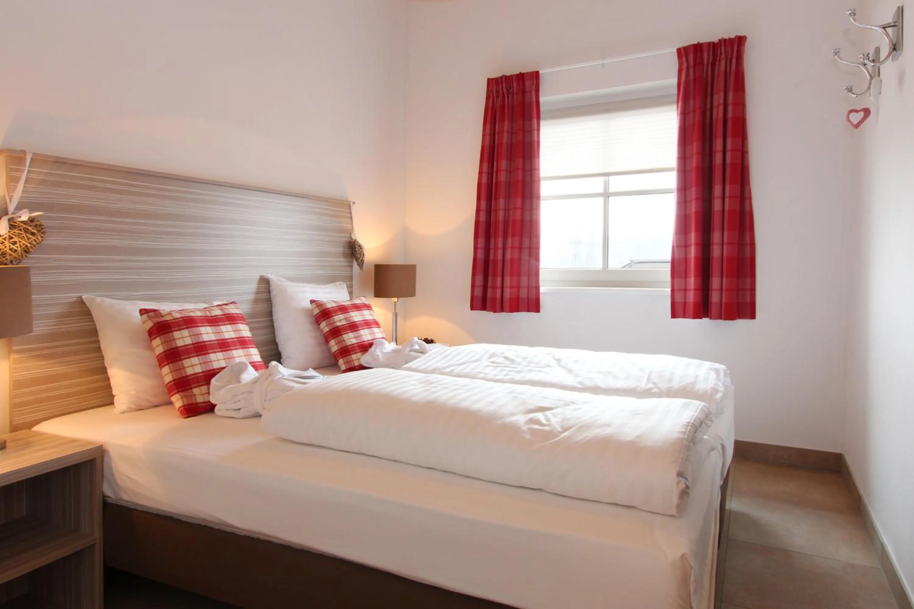 Bed in AvenidA Mountain Resort by Alpin Rentals