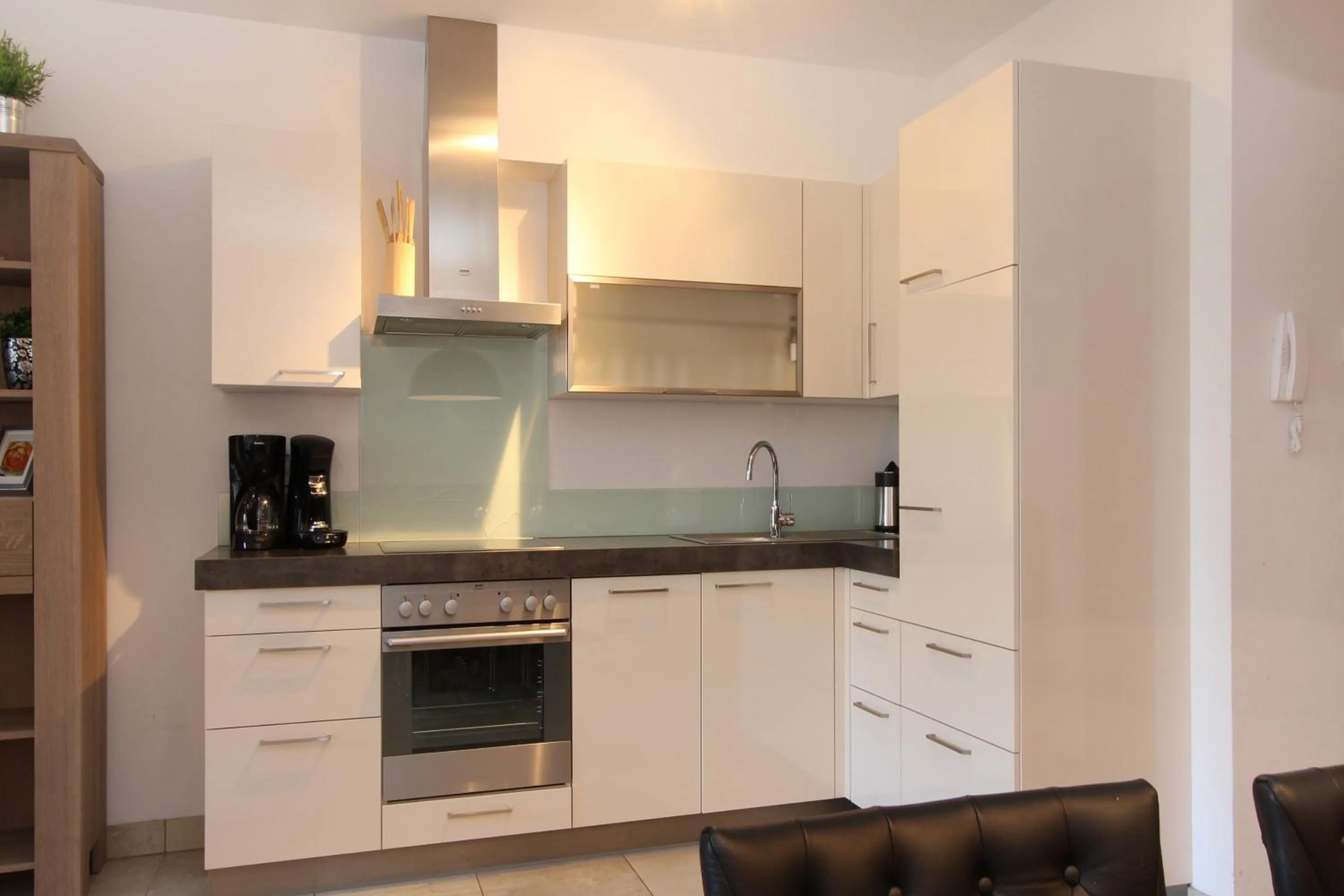 Kitchen or kitchenette in AvenidA Mountain Resort by Alpin Rentals