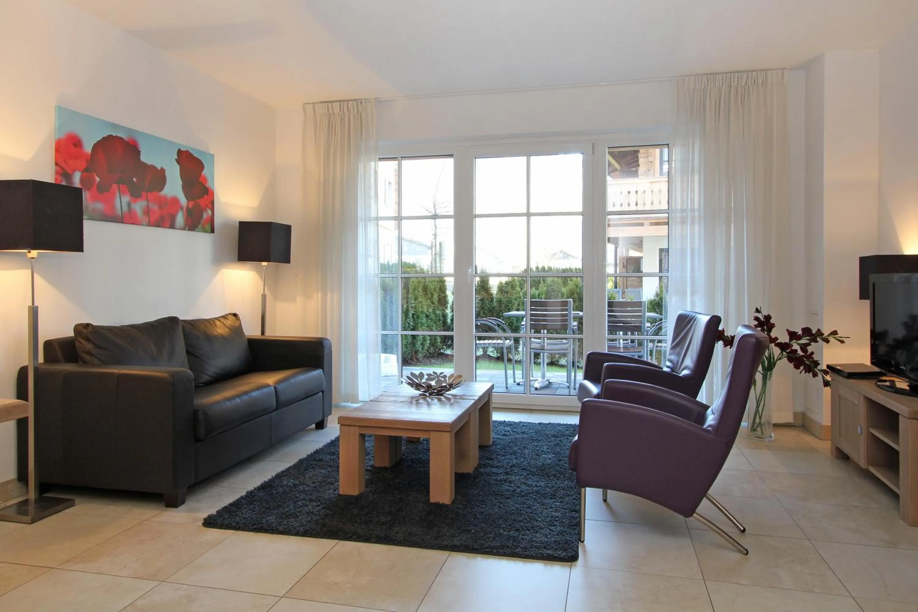 TV and multimedia in AvenidA Mountain Resort by Alpin Rentals