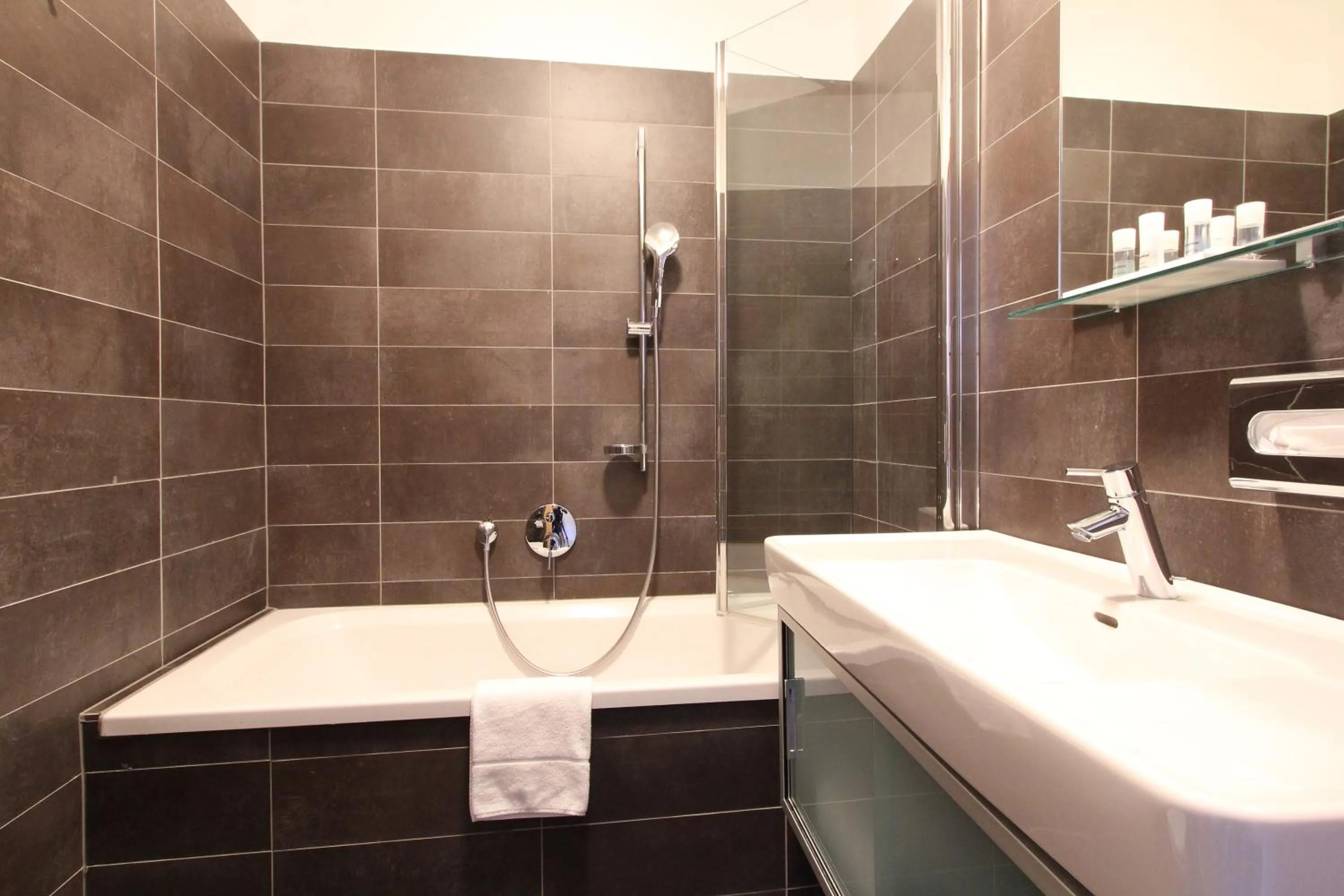 Shower in AvenidA Mountain Resort by Alpin Rentals