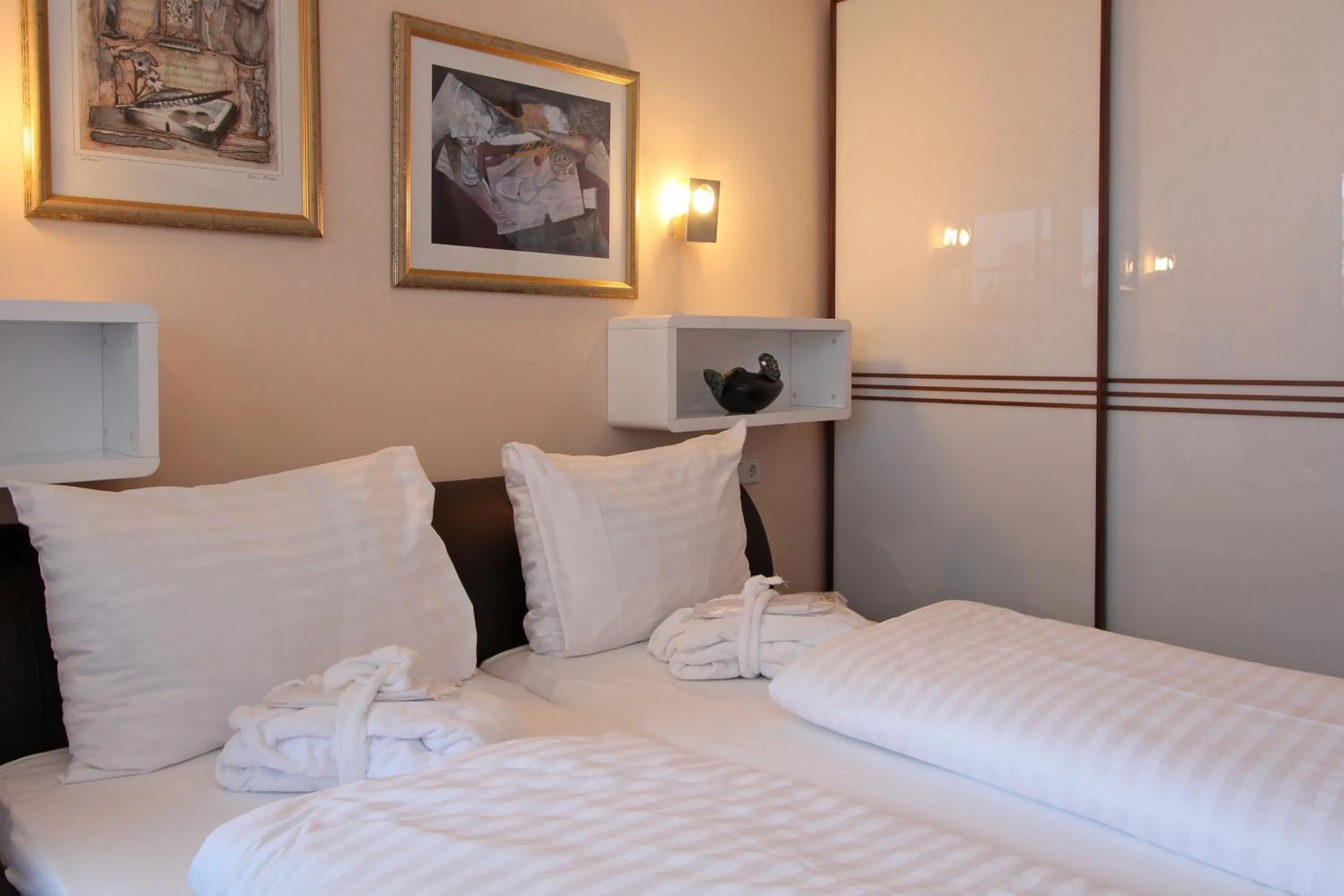 Bed in AvenidA Mountain Resort by Alpin Rentals