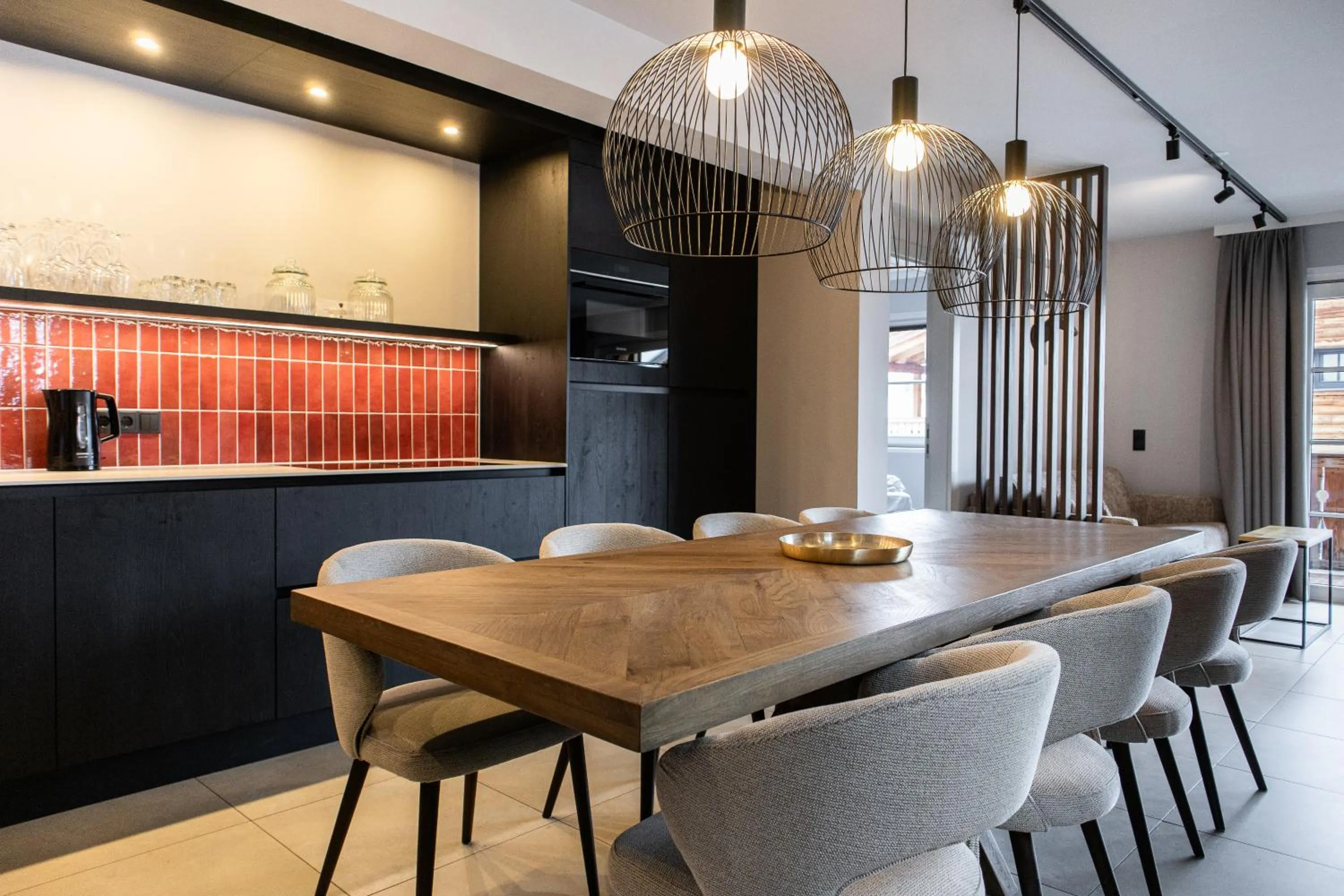 Dining area in AvenidA Mountain Resort by Alpin Rentals