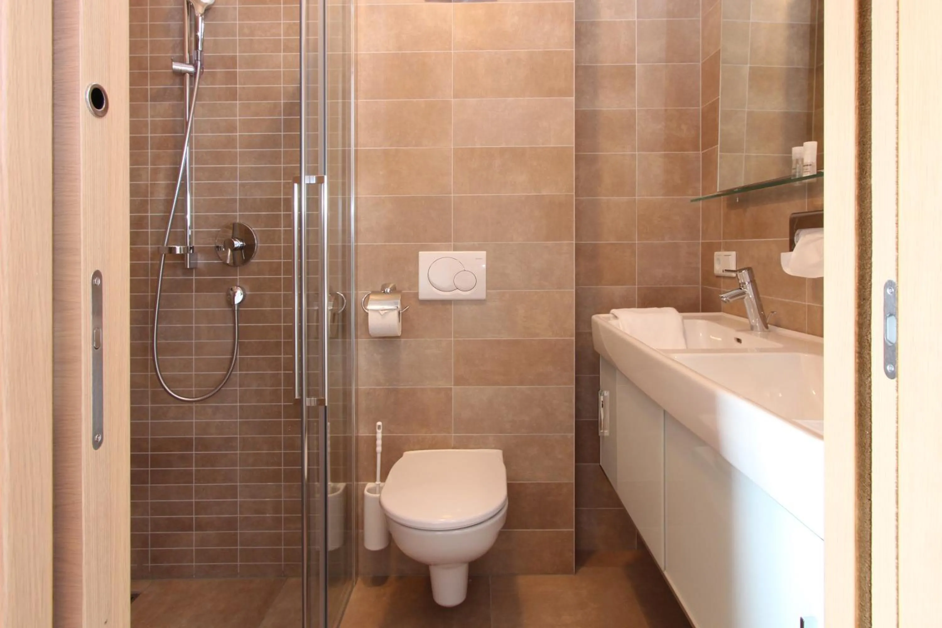 Shower in AvenidA Mountain Resort by Alpin Rentals