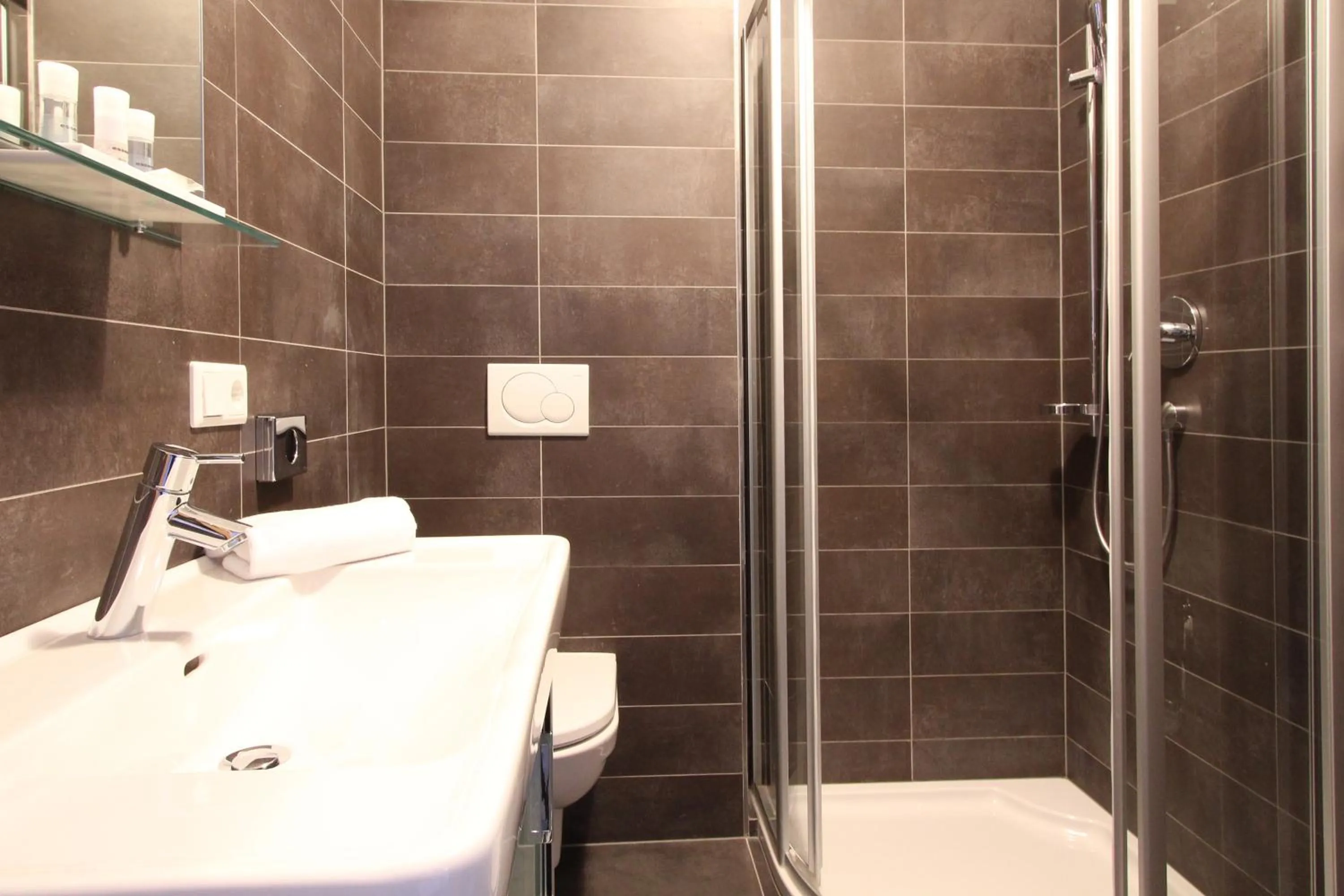 Shower in AvenidA Mountain Resort by Alpin Rentals