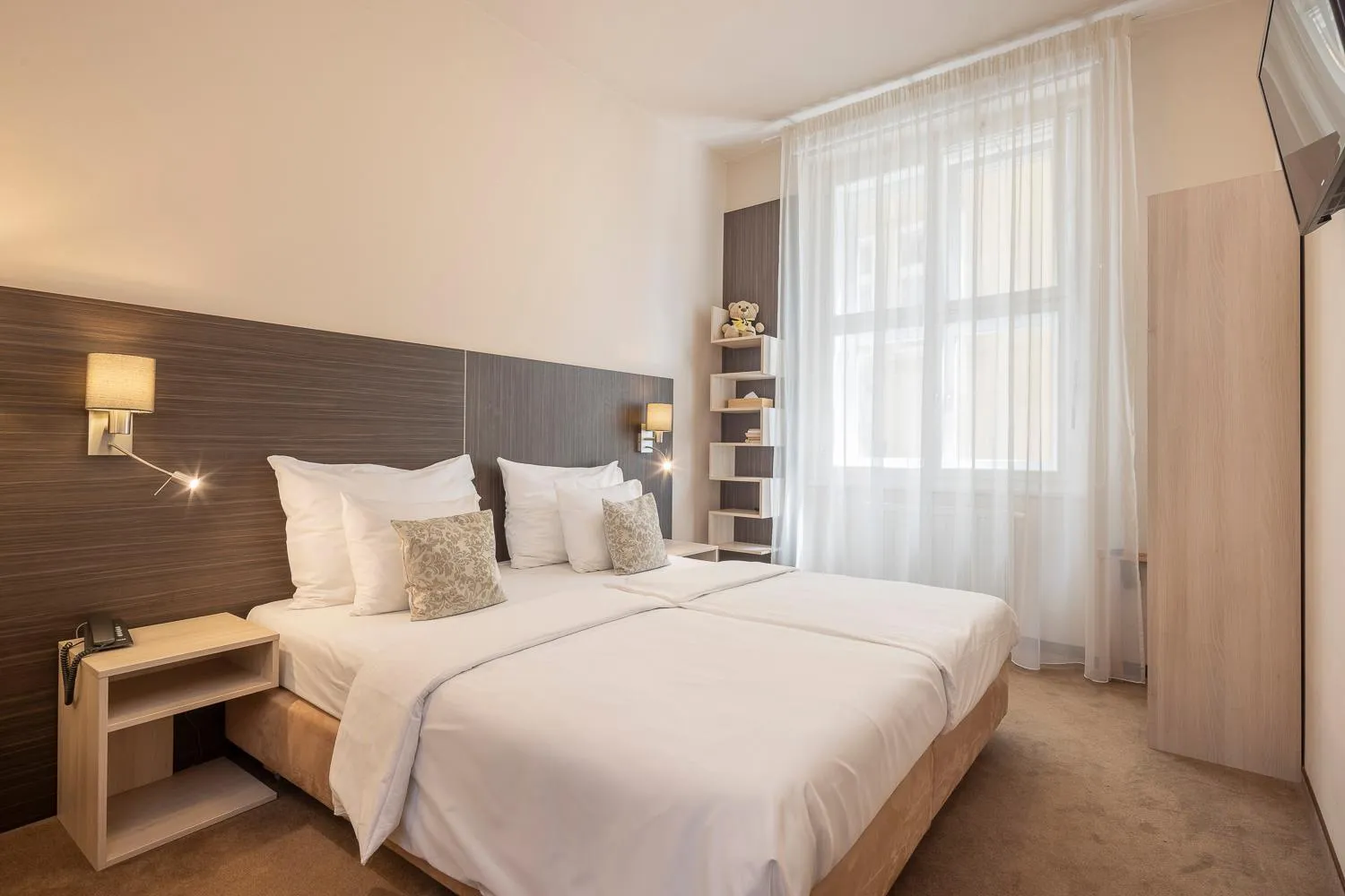 Bed in Pytloun Kampa Garden Hotel Prague