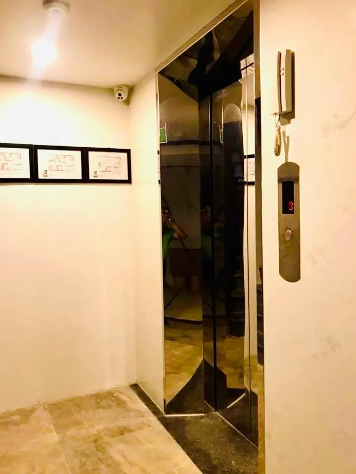 elevator in Unique Serviced Apartment