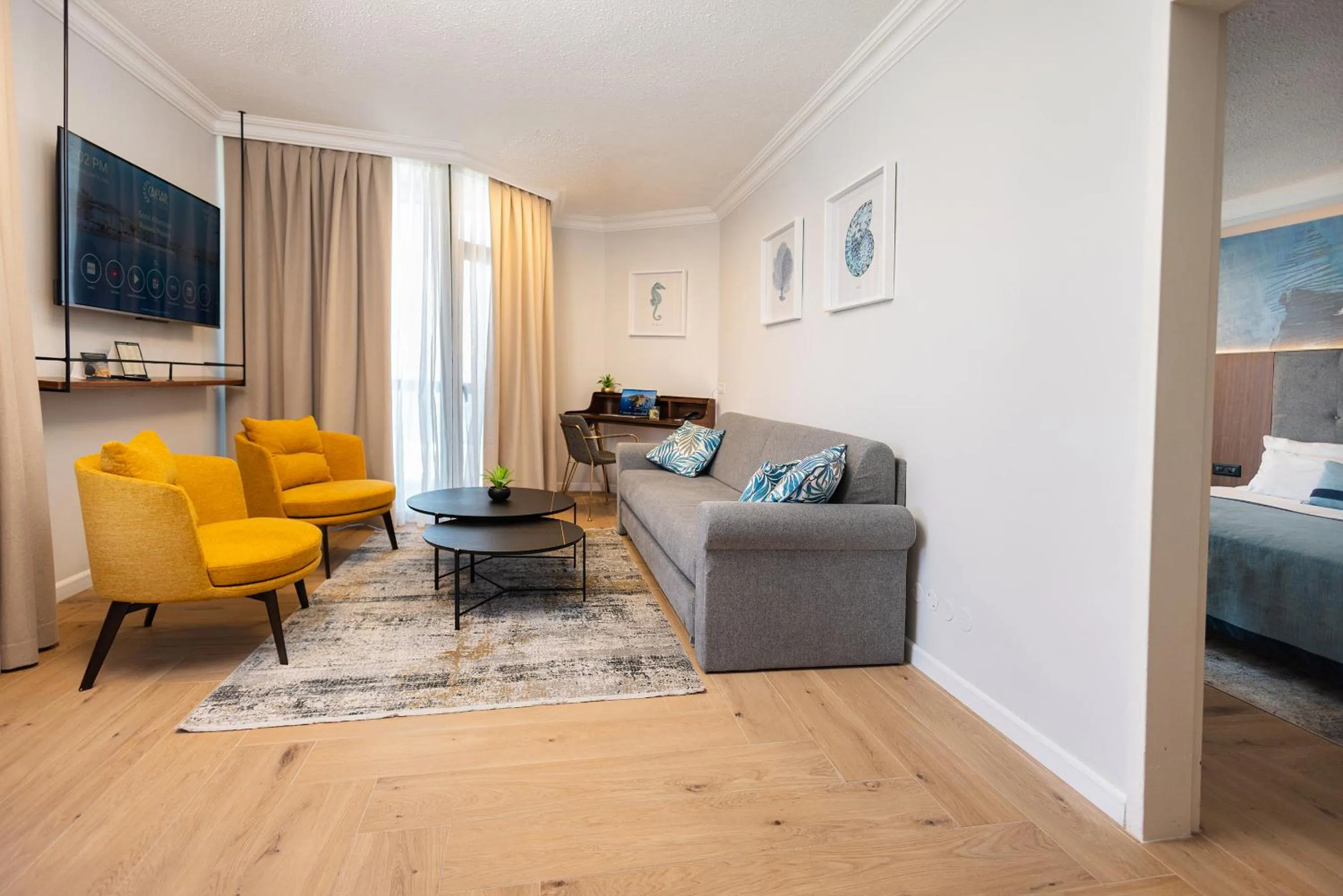 Living room, Bed in Caesar Premier Tiberias Hotel