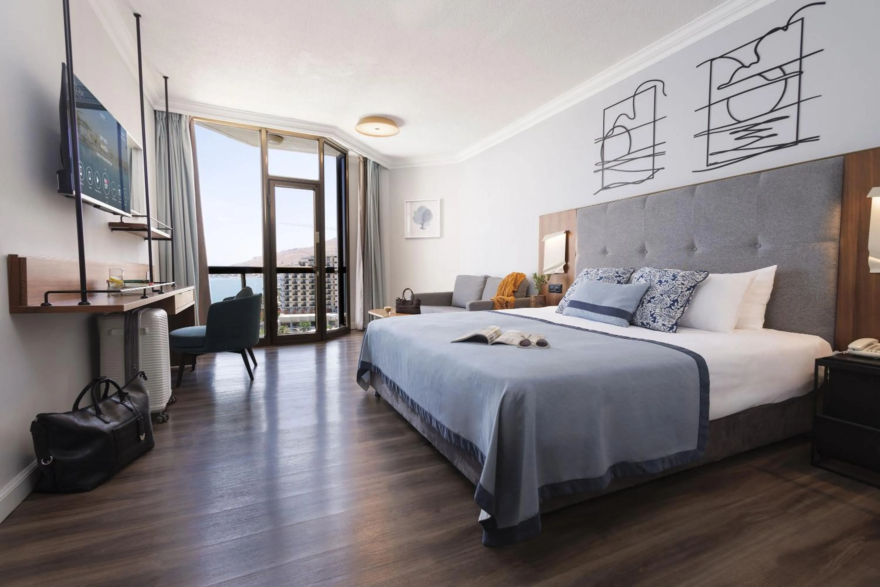 Bed in Caesar Premier Tiberias Hotel