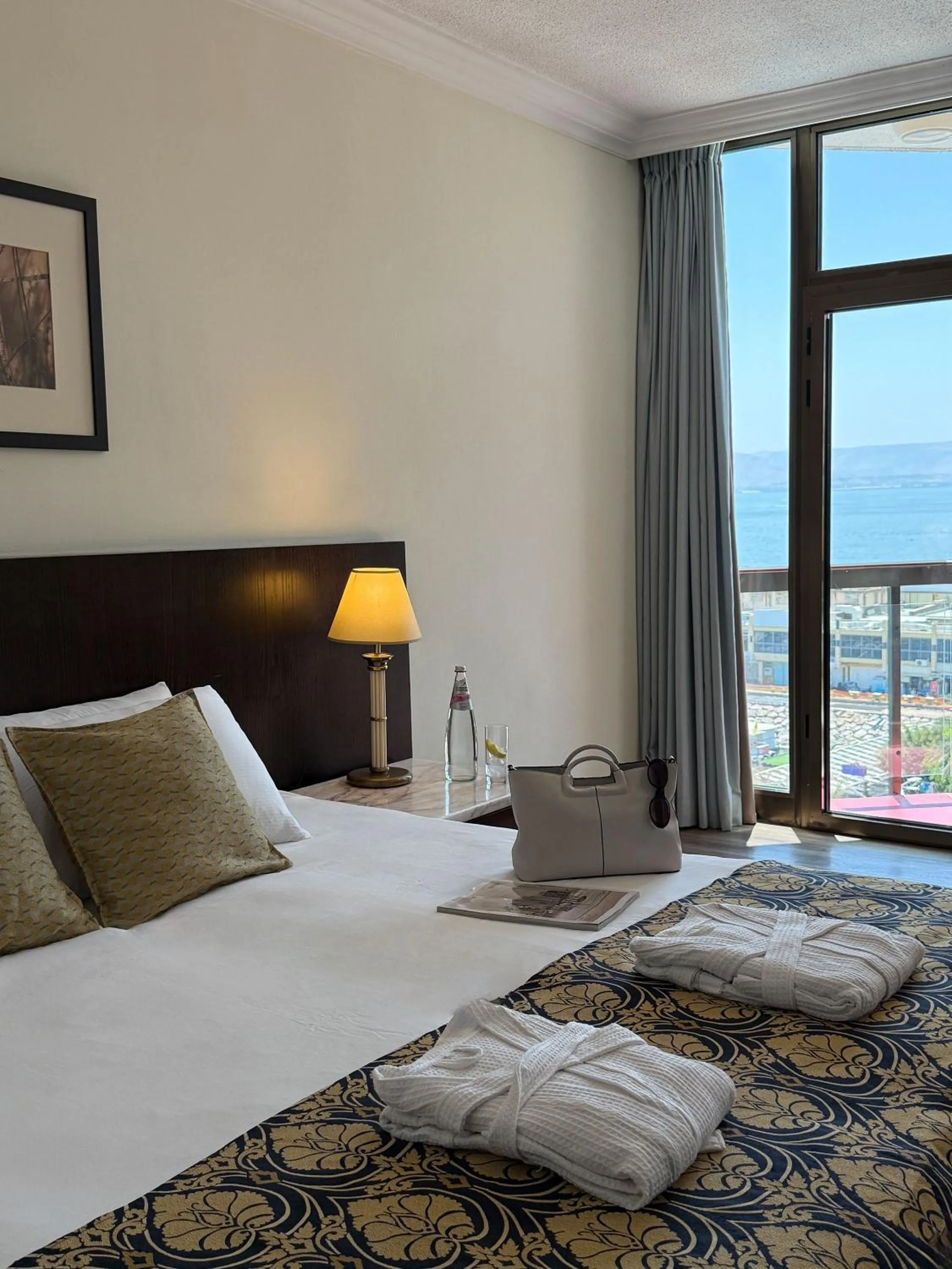 Bed in Caesar Premier Tiberias Hotel