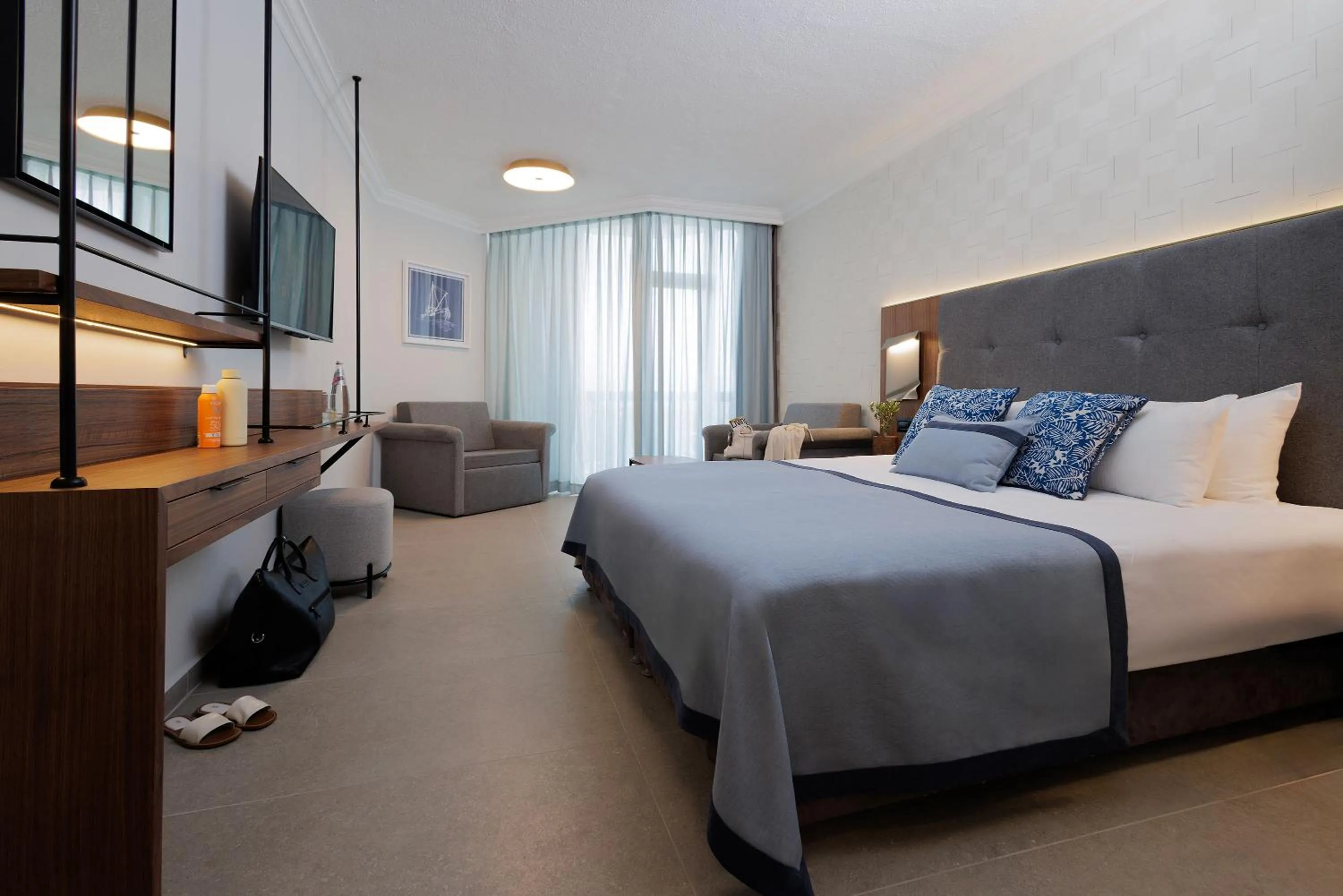 Bed in Caesar Premier Tiberias Hotel