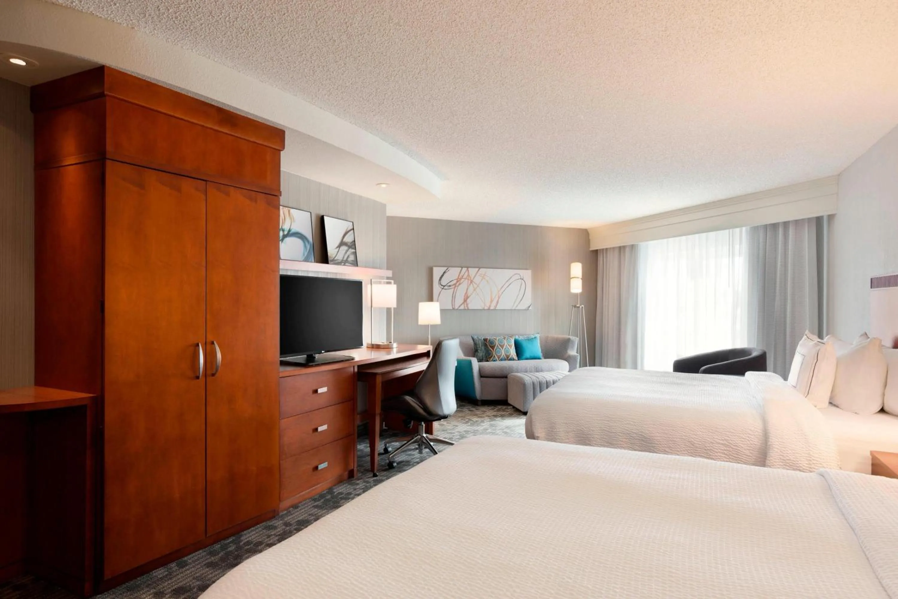 Photo of the whole room, Bed in Courtyard by Marriott Fort Smith Downtown