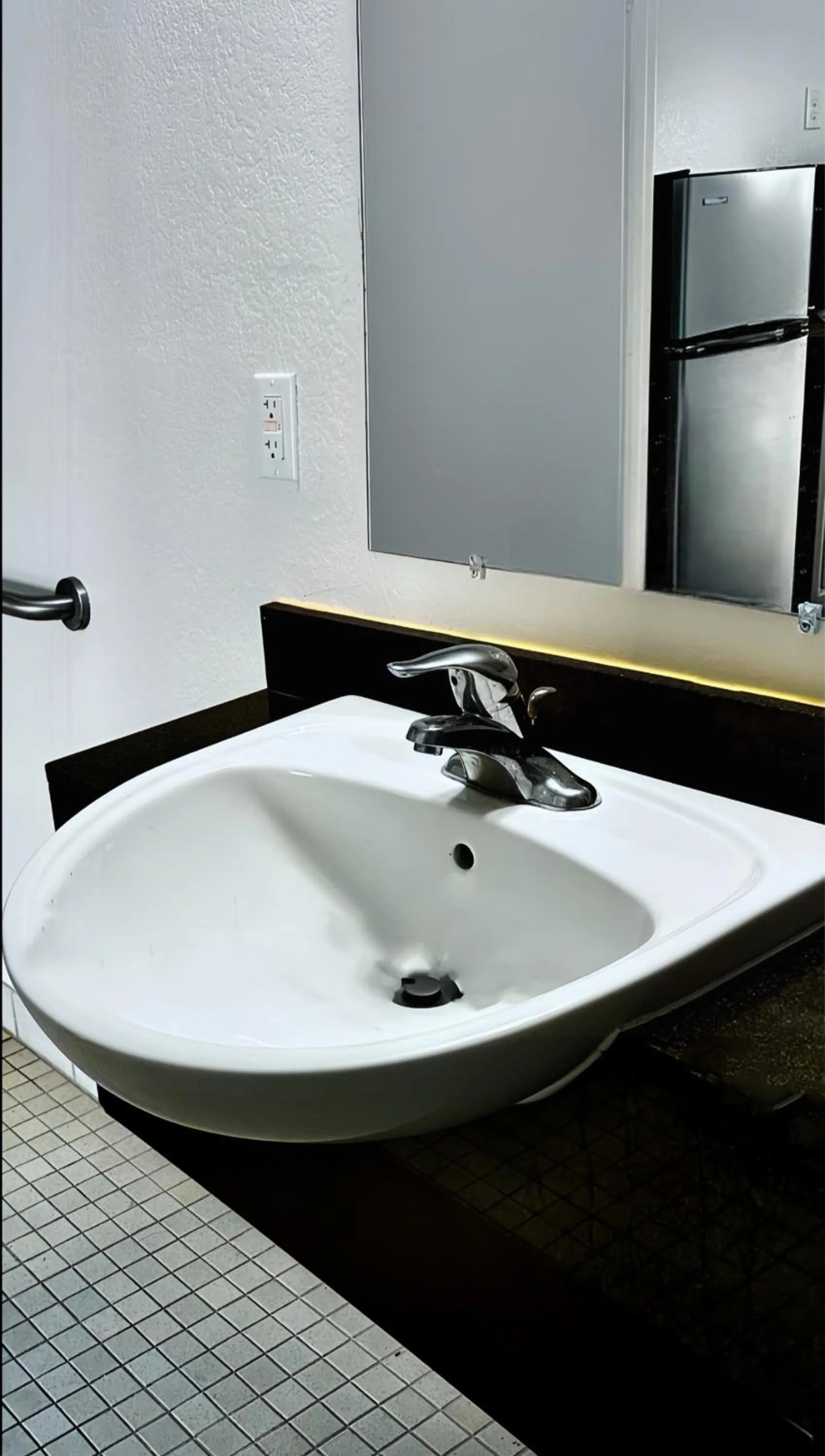 Bathroom in Studio City Suites, a Travelodge by Wyndham
