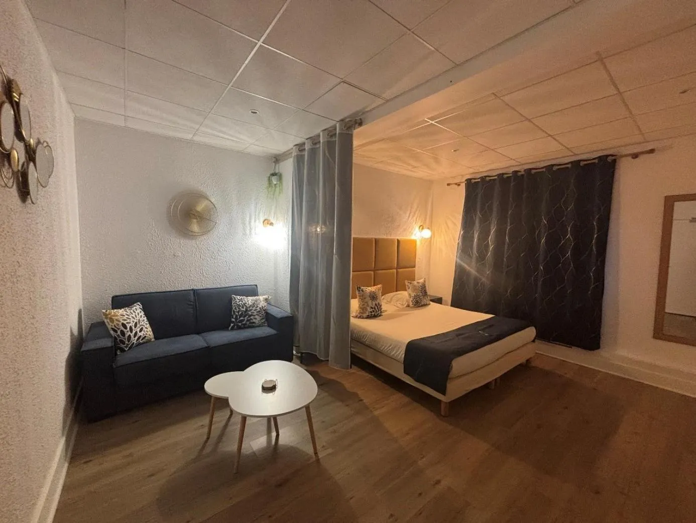 Bed in Logis Hotel Beaudon