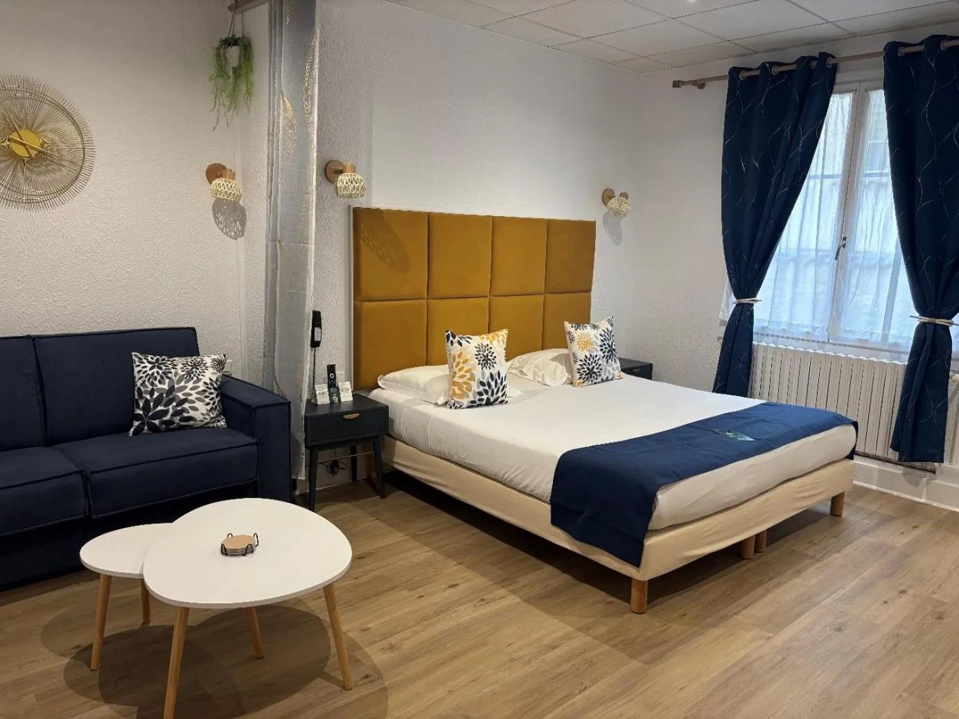 Bed in Logis Hotel Beaudon