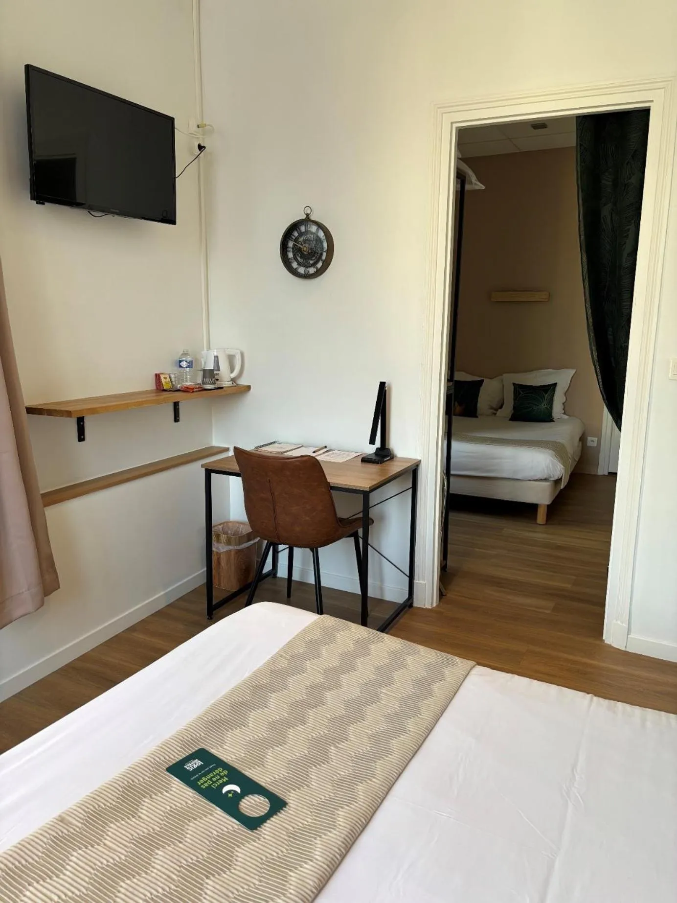 Bed in Logis Hotel Beaudon