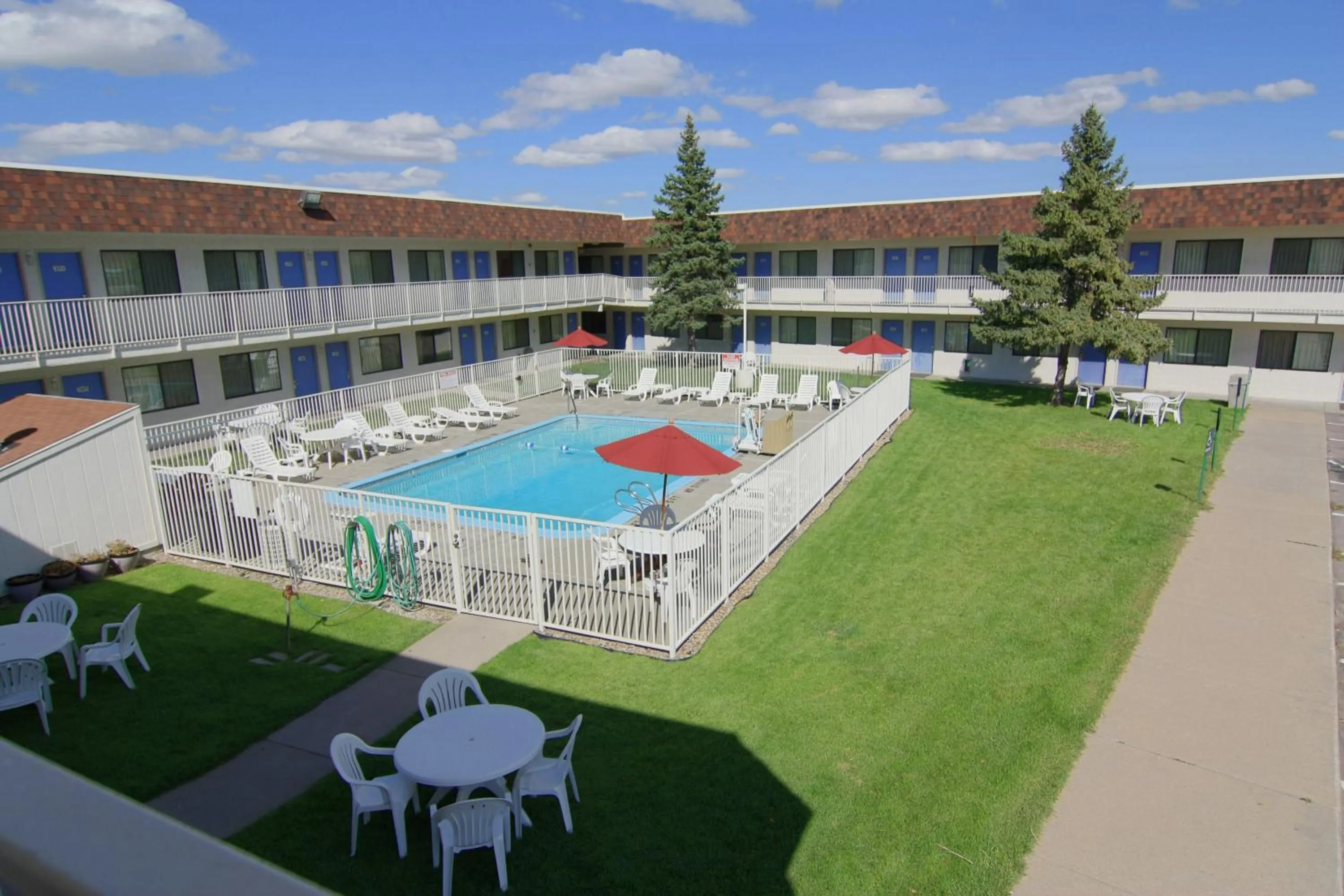 Facade/entrance, Pool View in Motel 6-Rapid City, SD