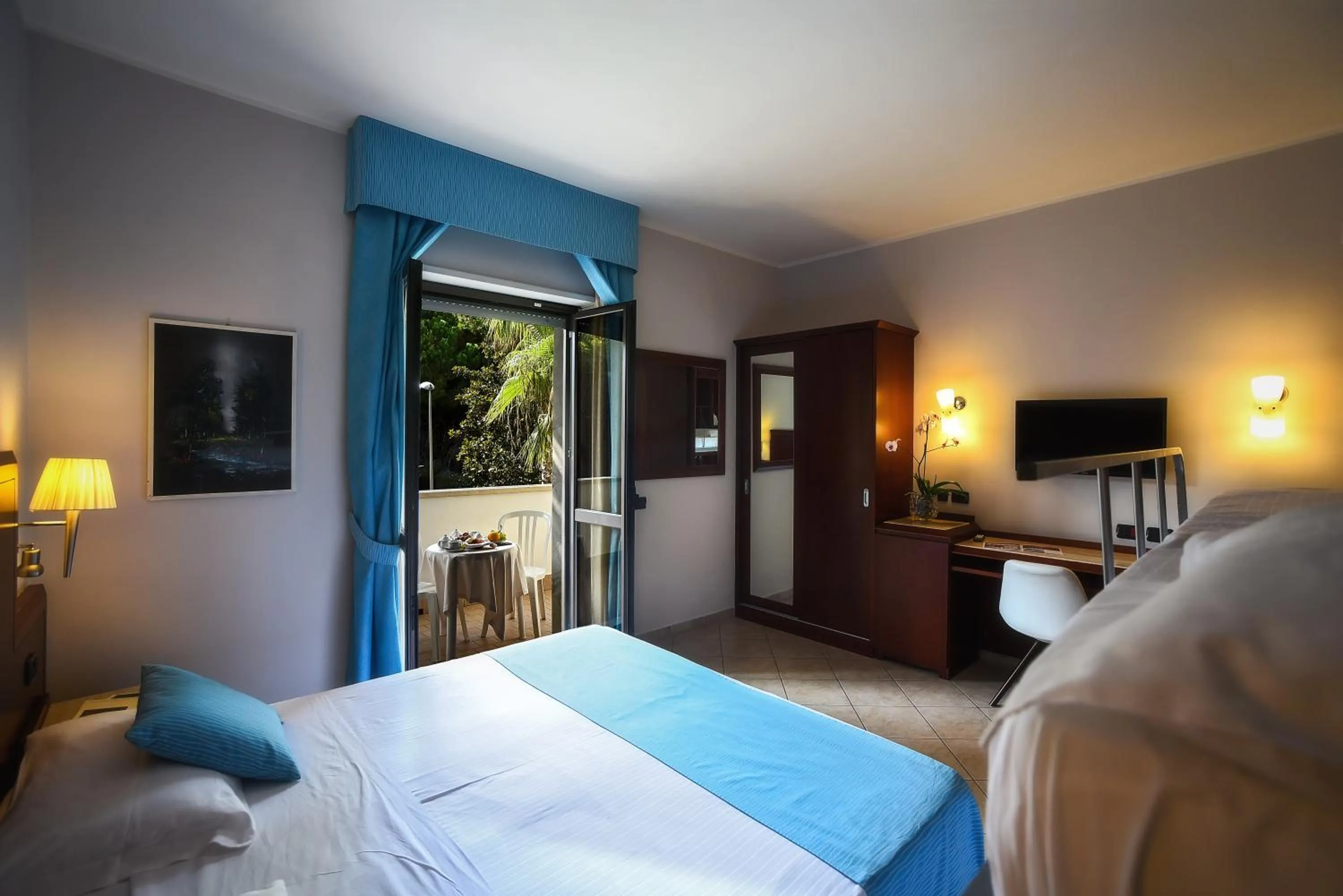 Bed in Hotel Le Palme