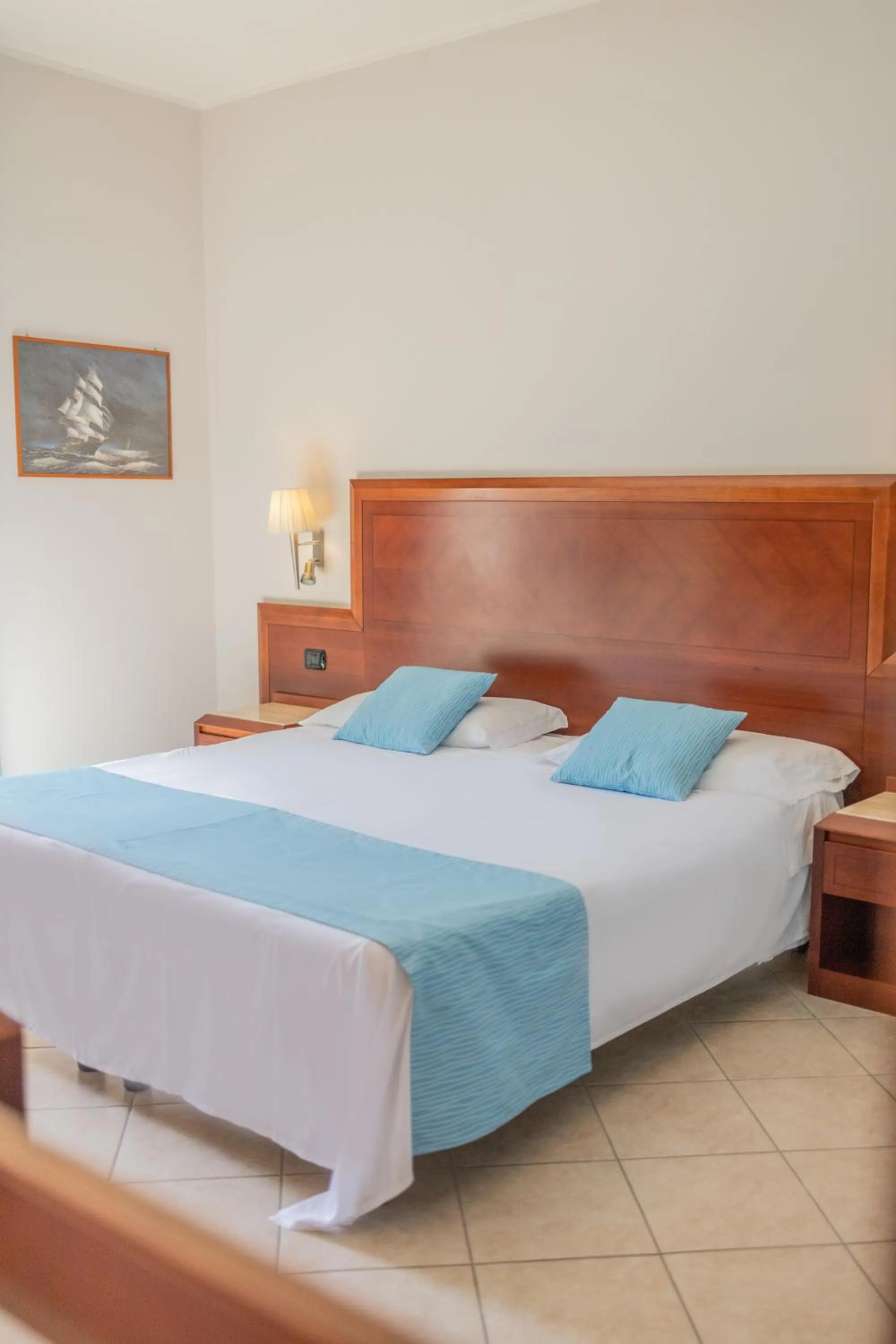 Bed in Hotel Le Palme