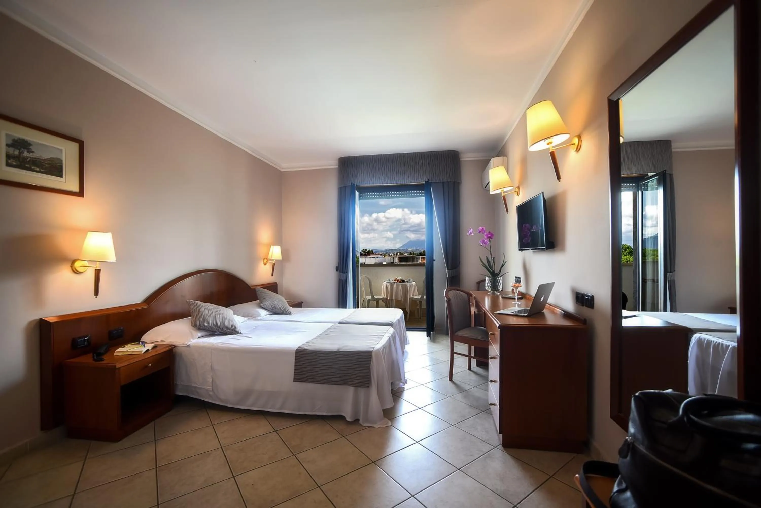 Bed in Hotel Le Palme