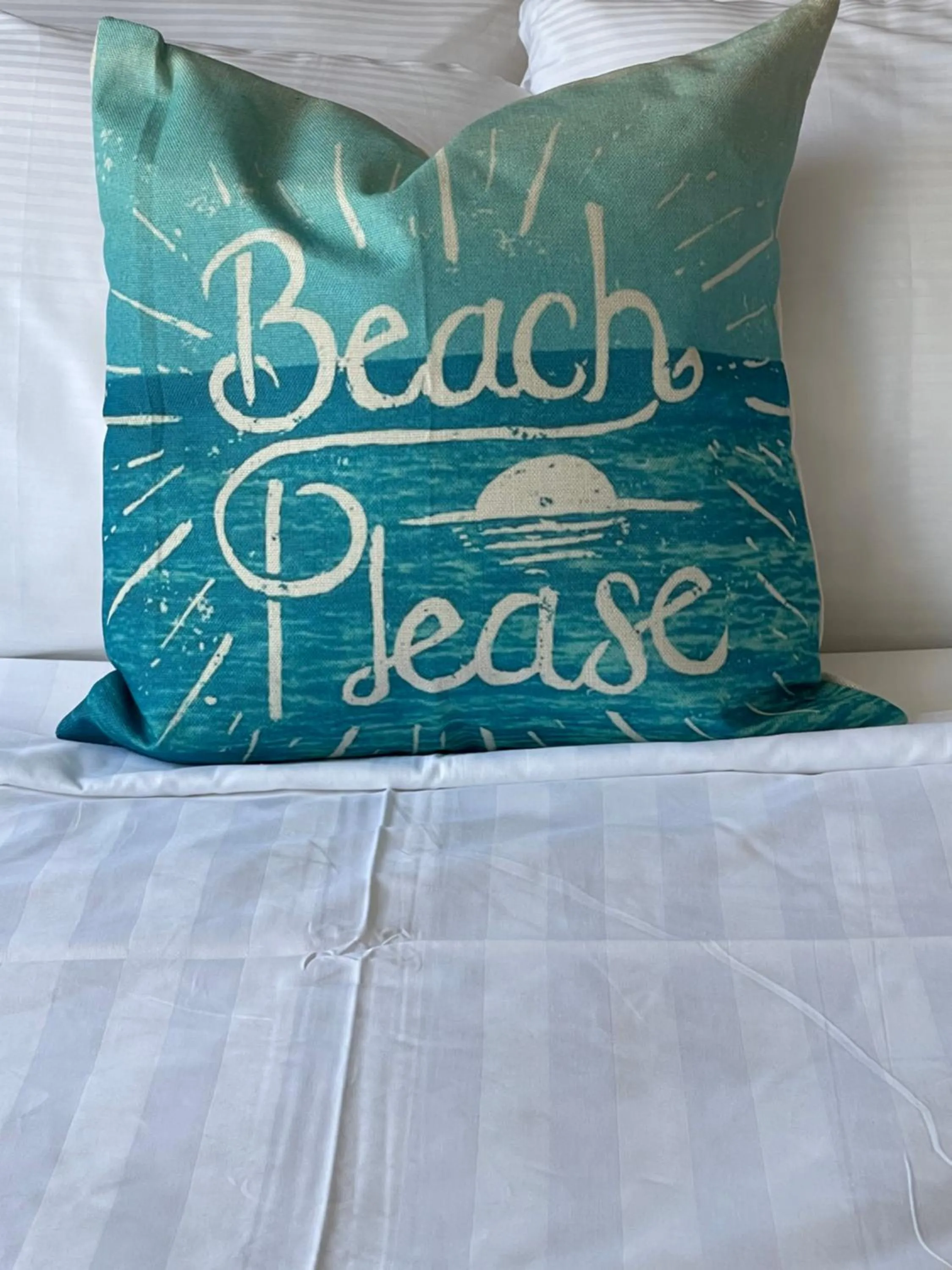 Bed in The Palomar Inn