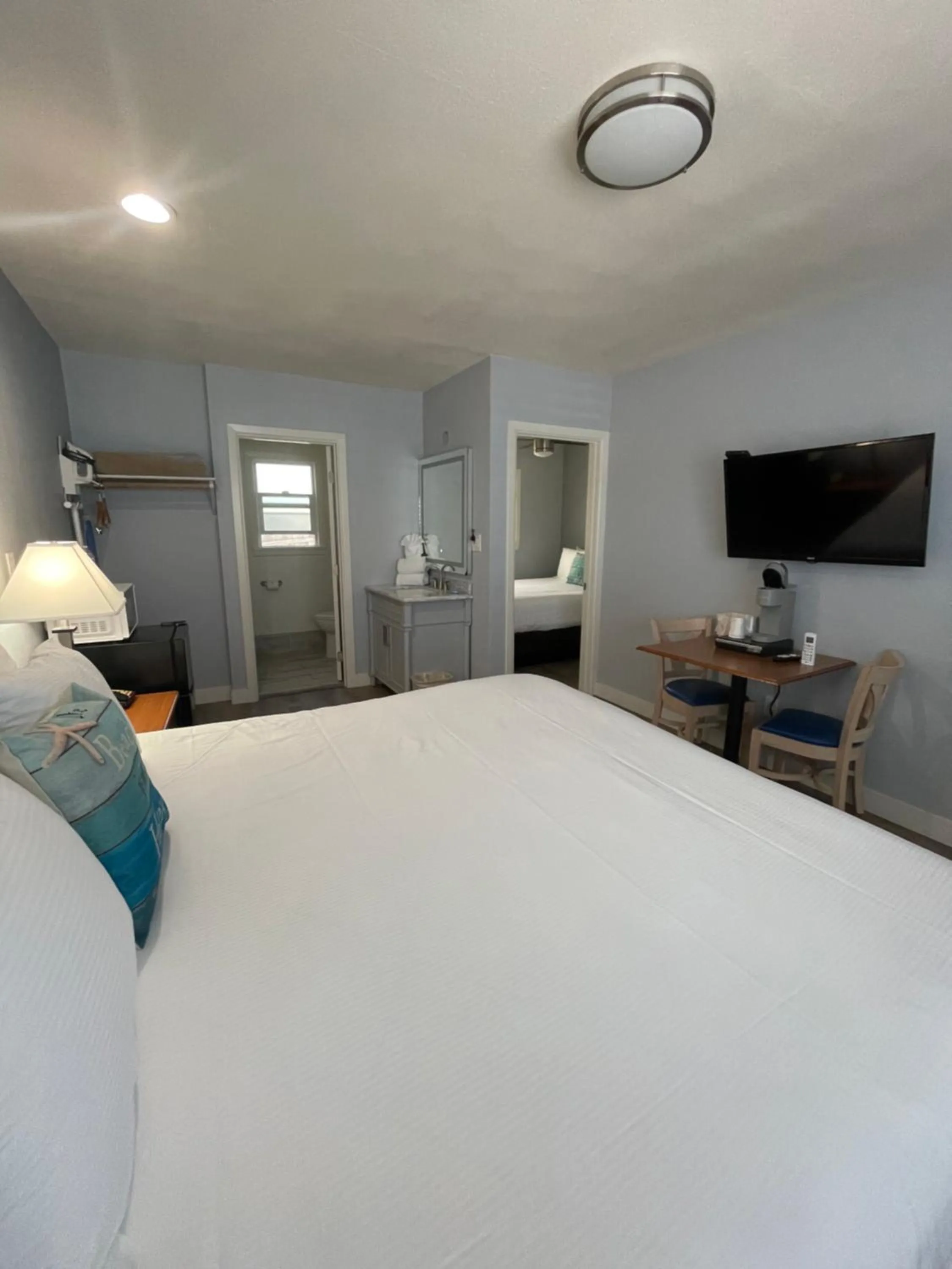 Bed in The Palomar Inn