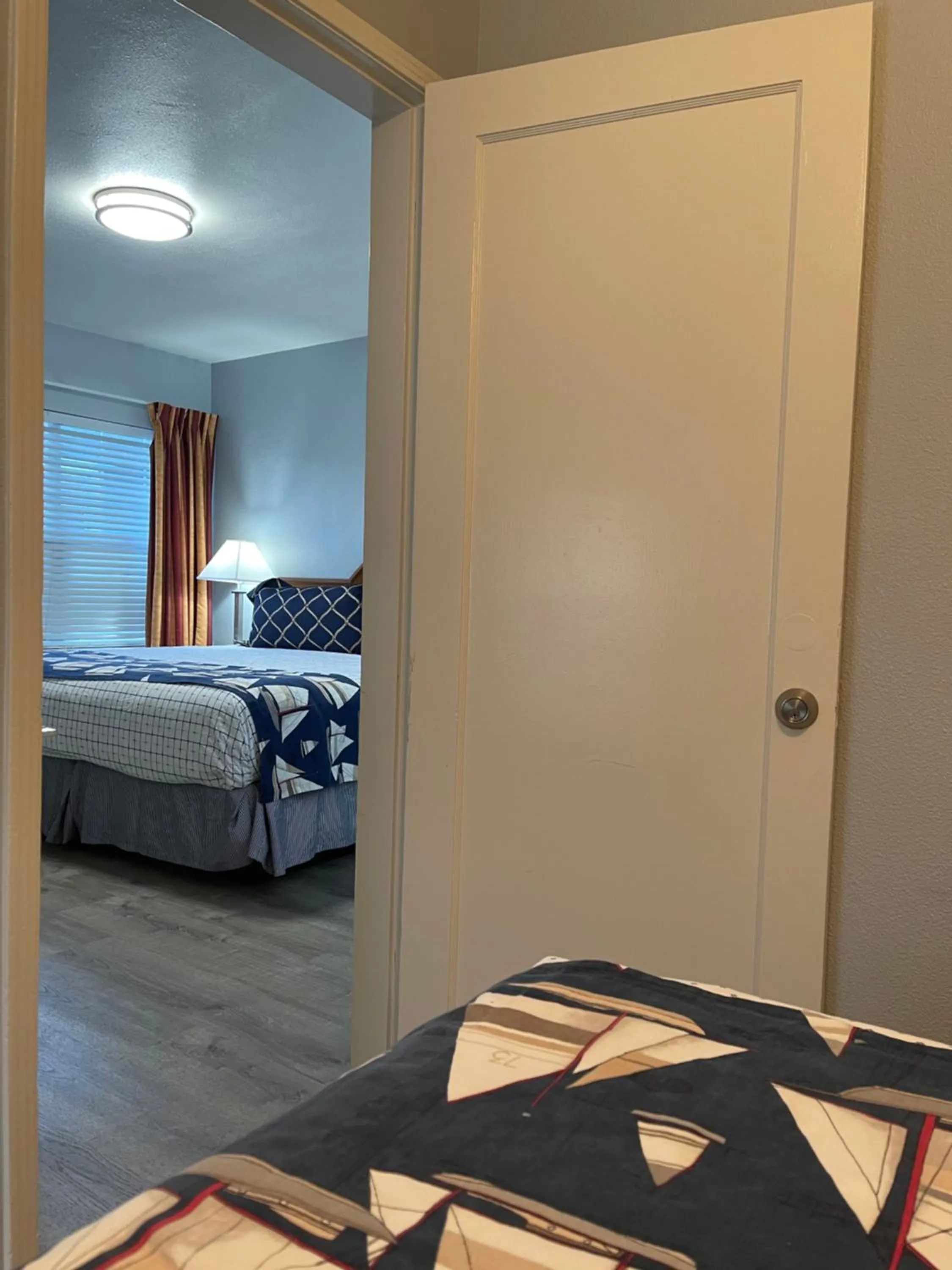 Bed in The Palomar Inn